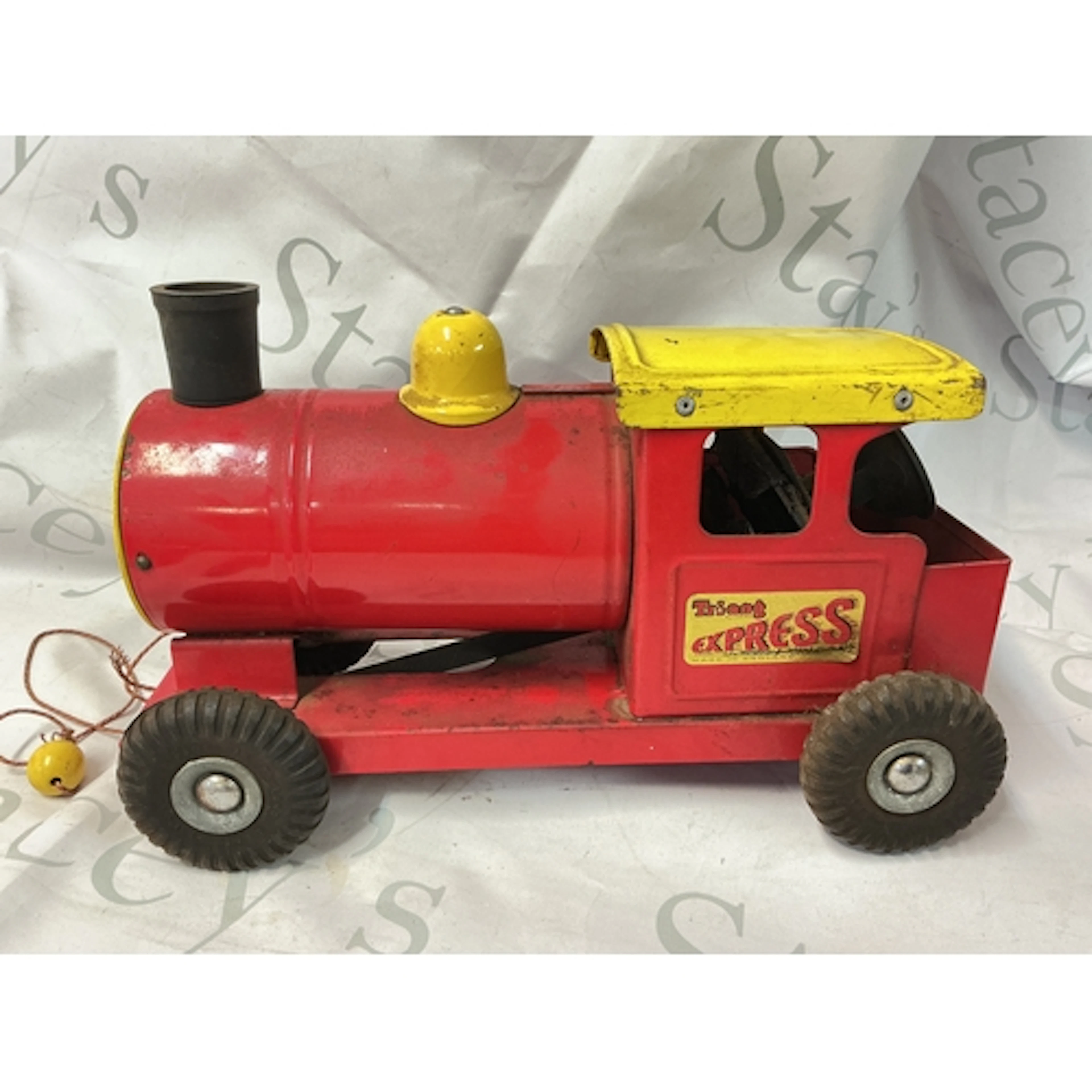 A Tri-Ang Puff-Puff Tin Plate Train.