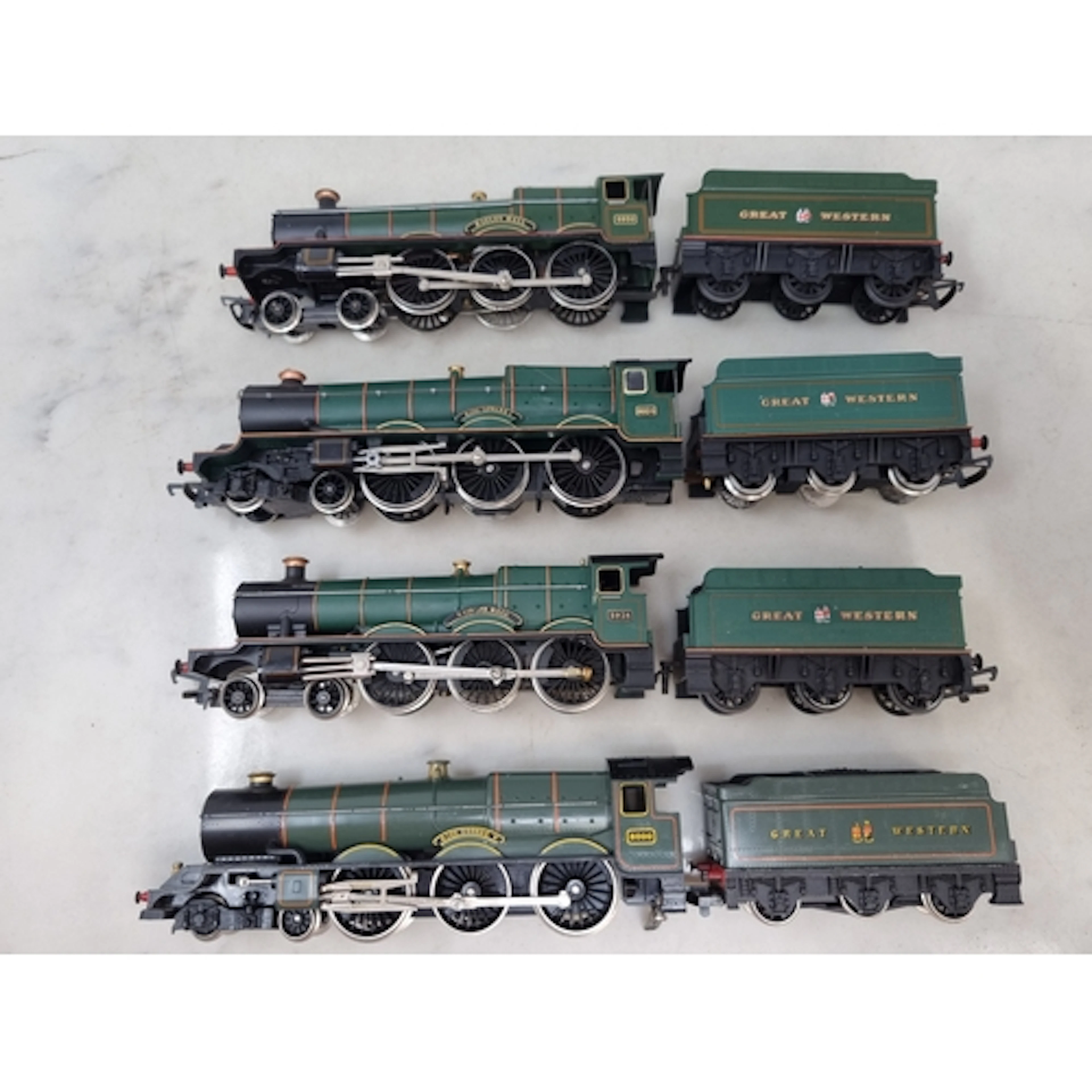 Four unboxed Hornby and Lima 00 gauge GWR Locomotives compri...