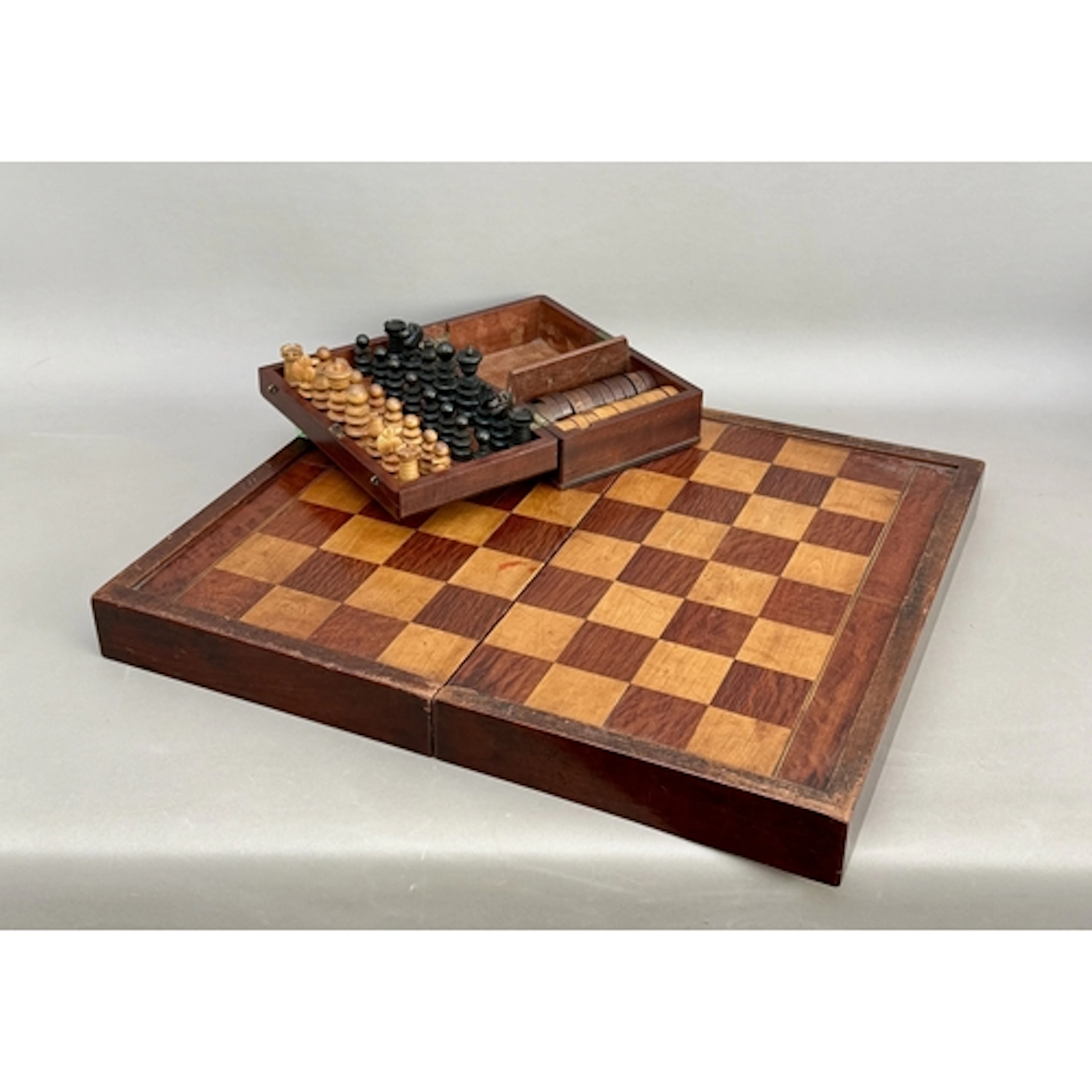 A 19th century folding satinwood, partridgewood and mahogany...