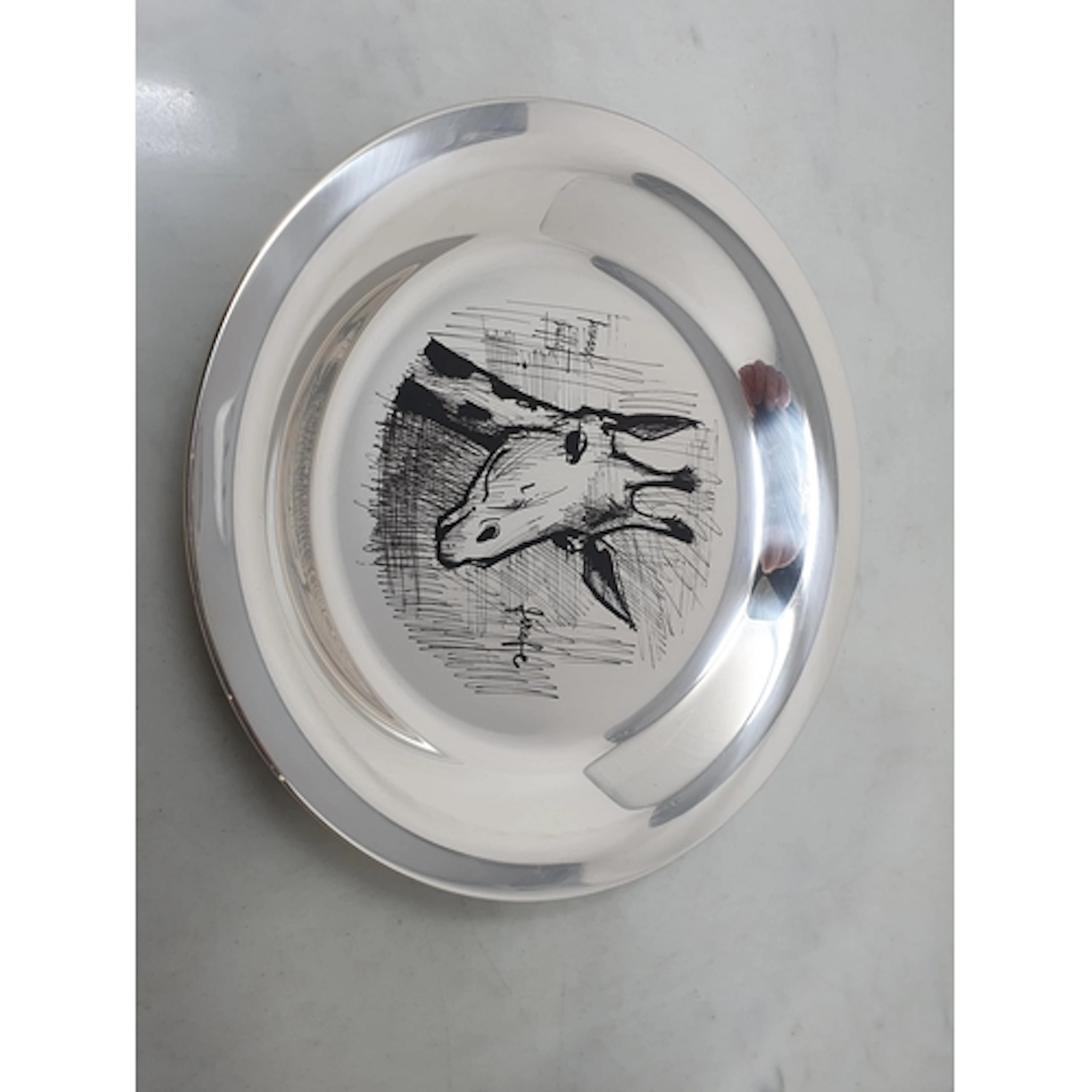 An Elizabeth II silver Giraffe Plate by Bernard Buffet, Lond...