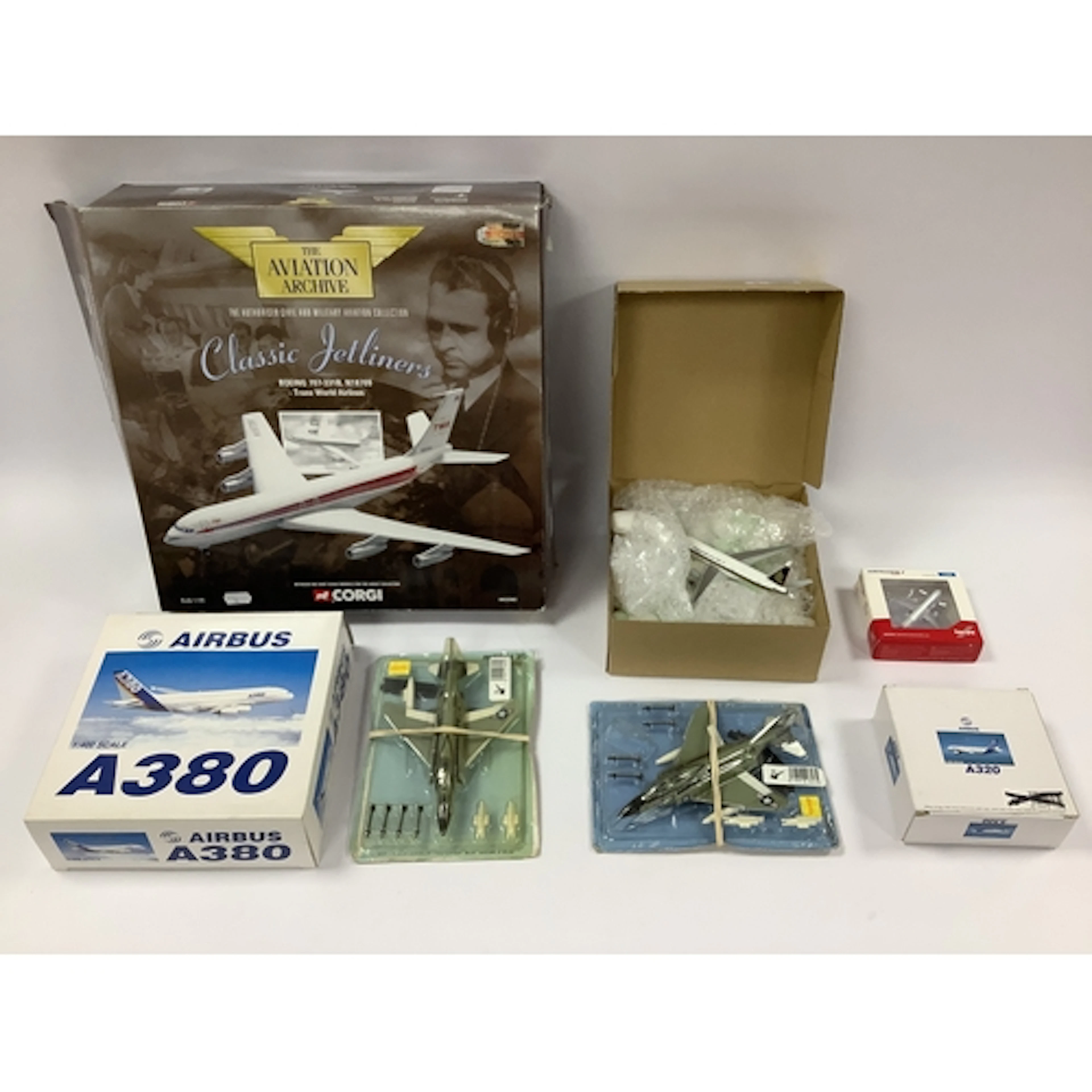 Six diecast model military and commercial aircraft by Corgi,...