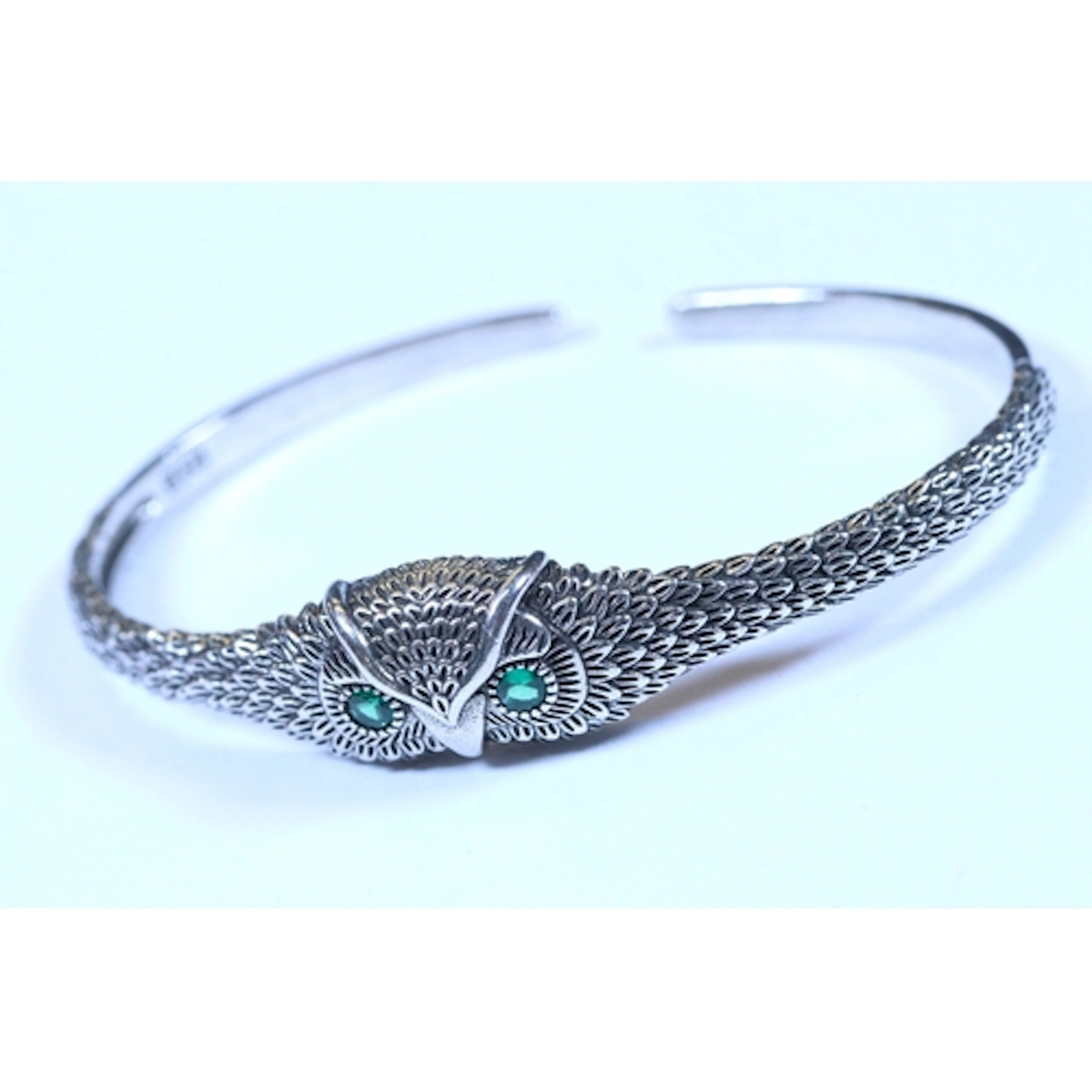 A contemporary 925 sterling silver open backed bangle bracel...
