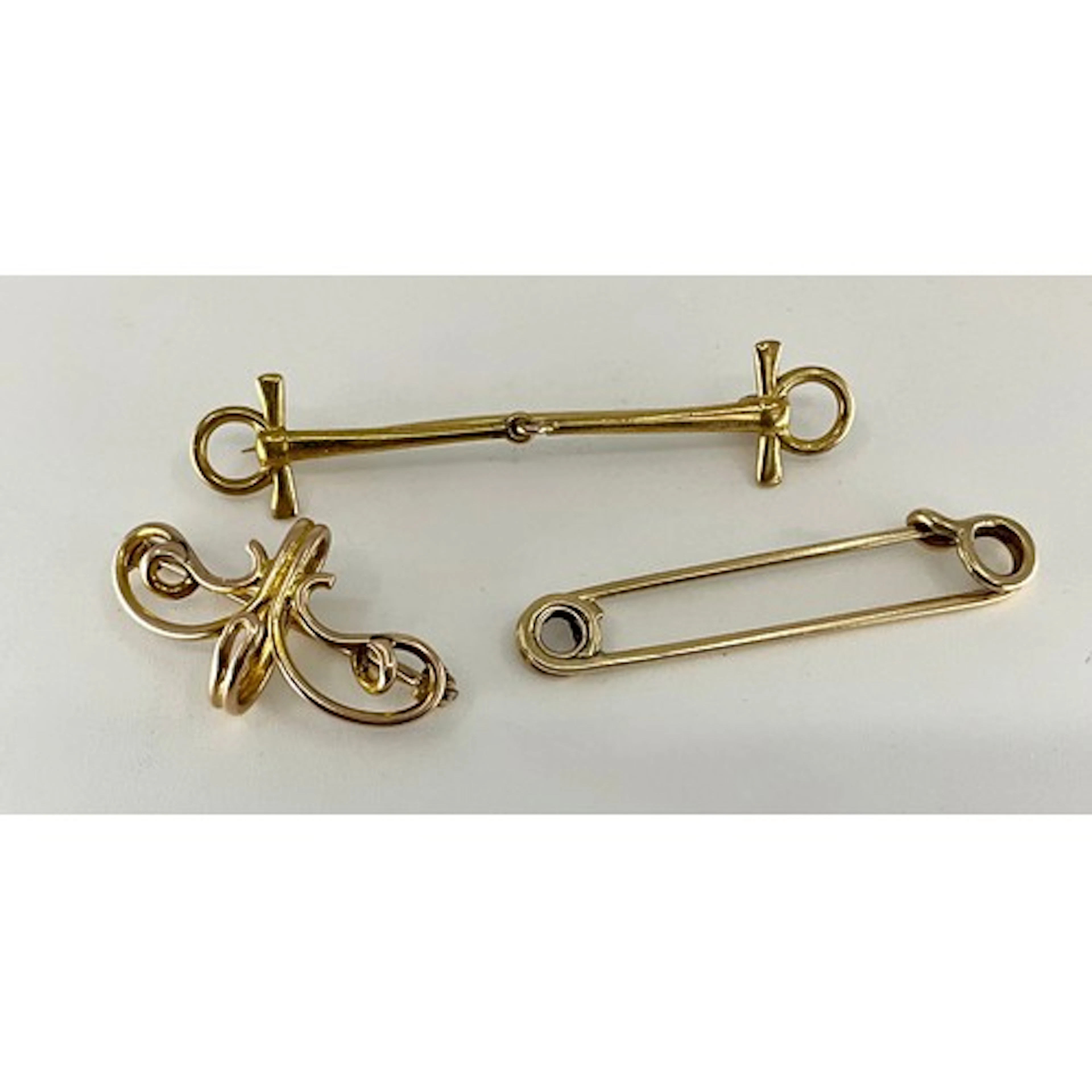 An Equestrian interest snaffle bit brooch, stamped 14, 49mm ...