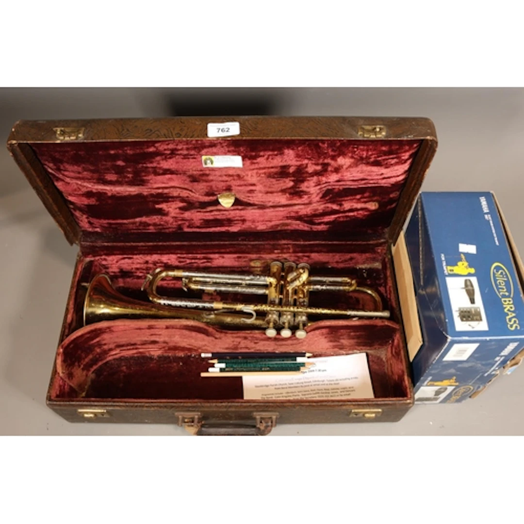 Cased Martin brass trumpet