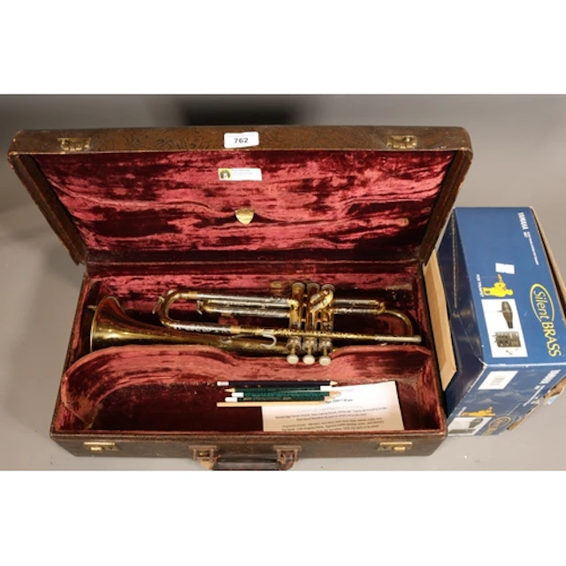 Cased Martin brass trumpet