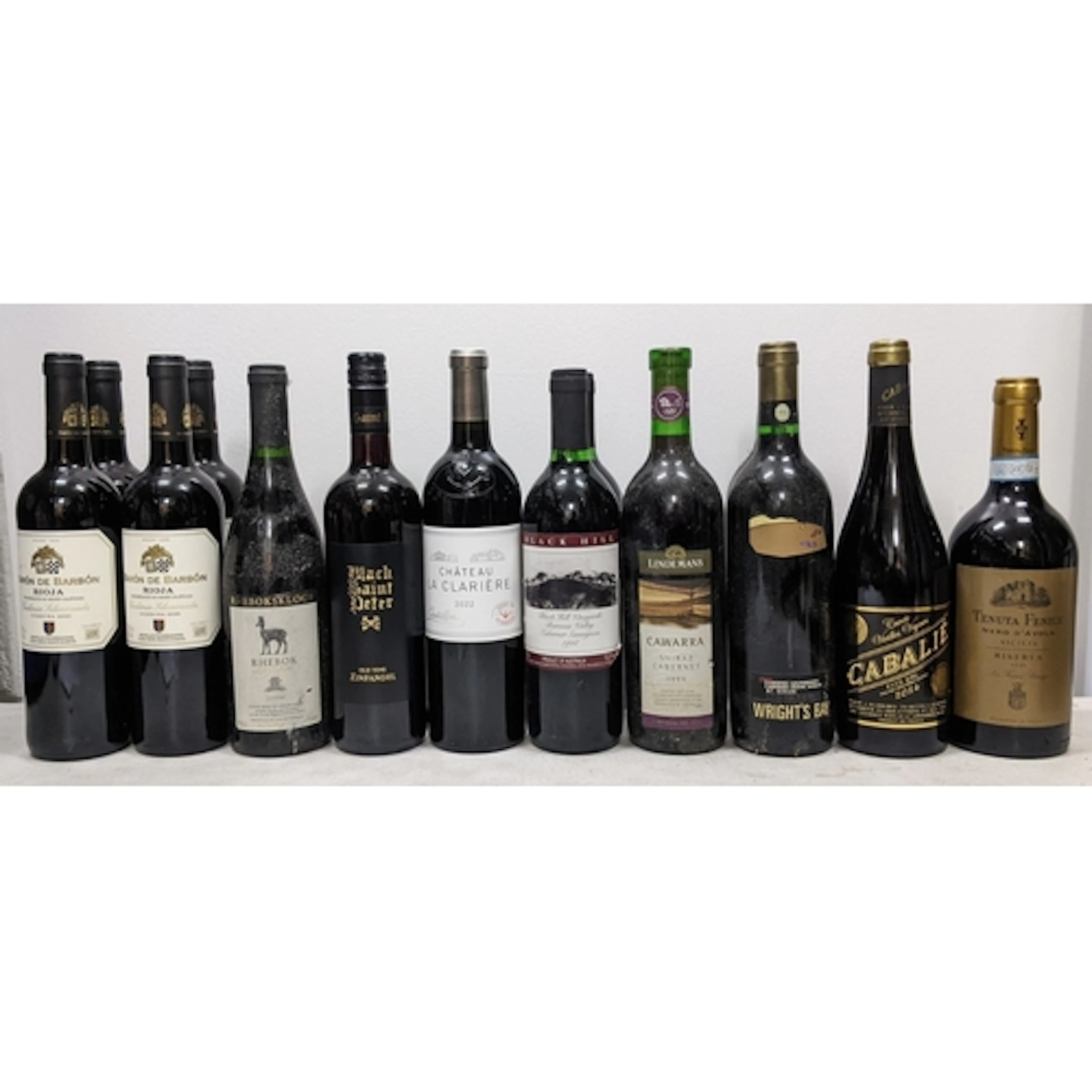 Fourteen bottles of assorted red wine, comprising:- - Two bo...