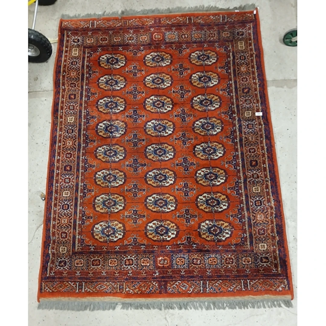 Large red Persian style rug.