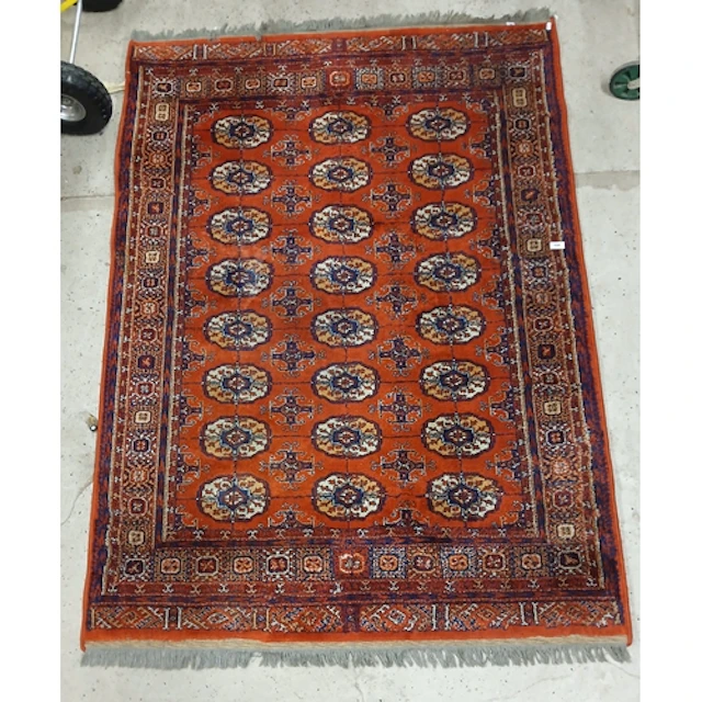Large red Persian style rug.