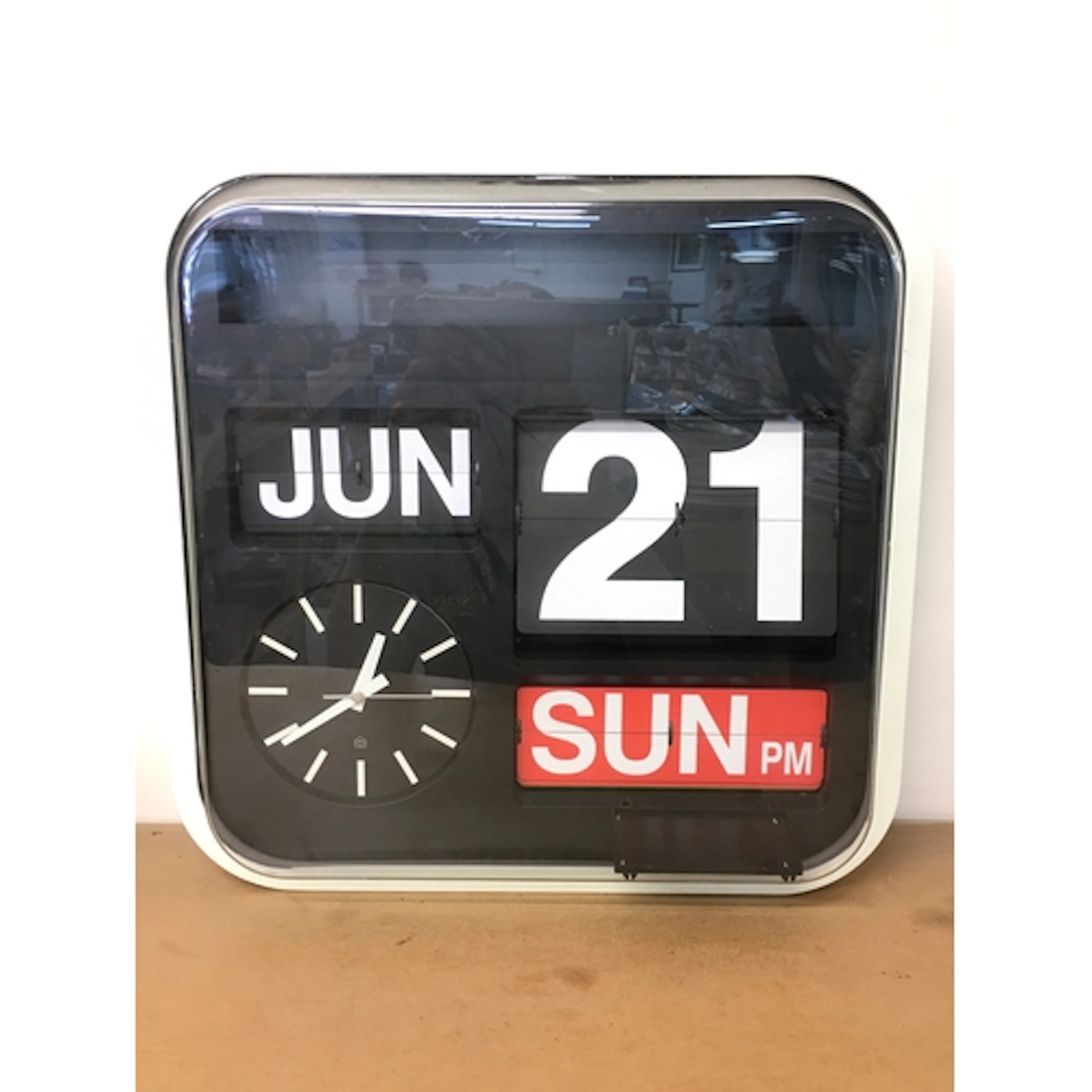 A vintage style battery operated wall clock, 43cm wide 42cm ...