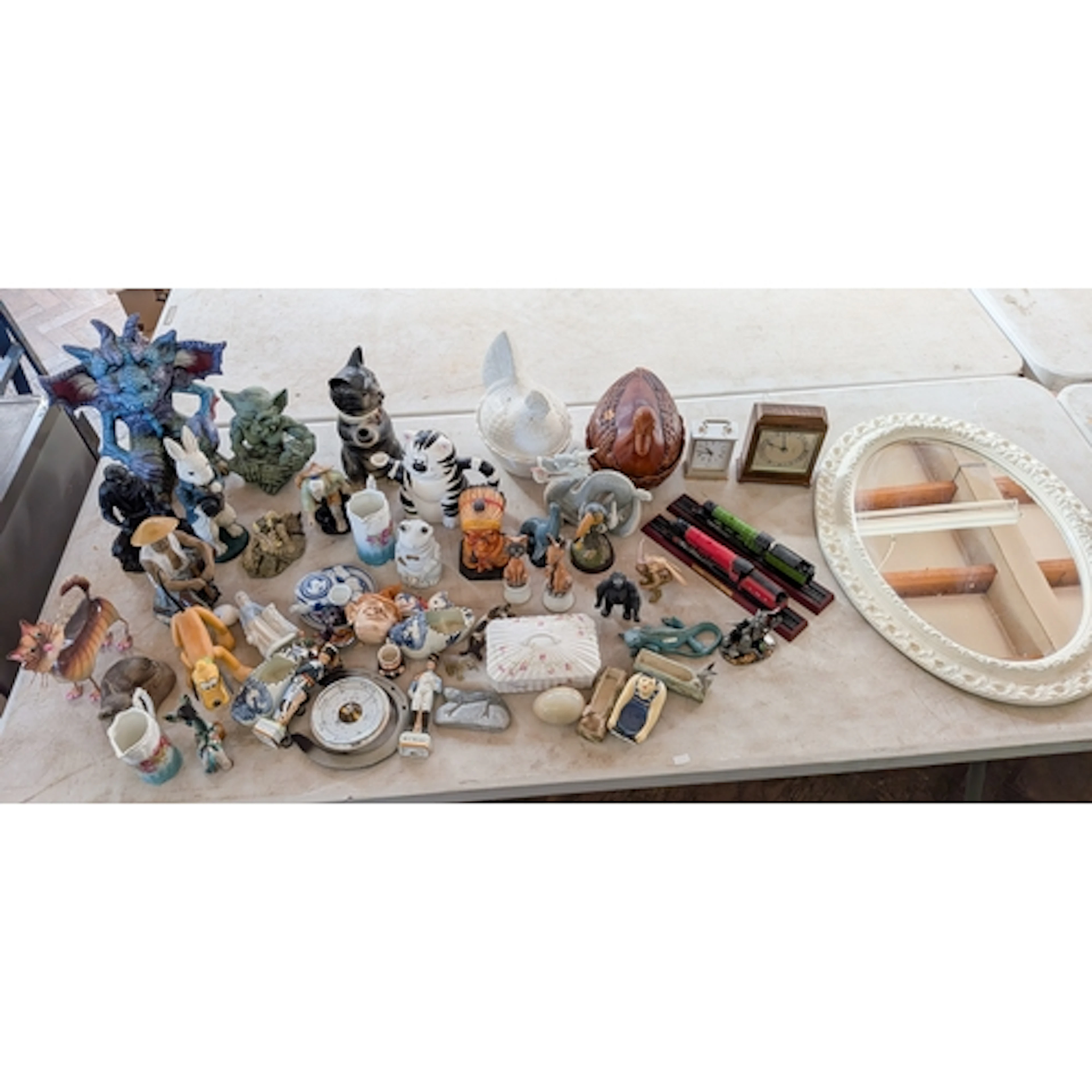Two boxes of house clearance items to include clock, china c...