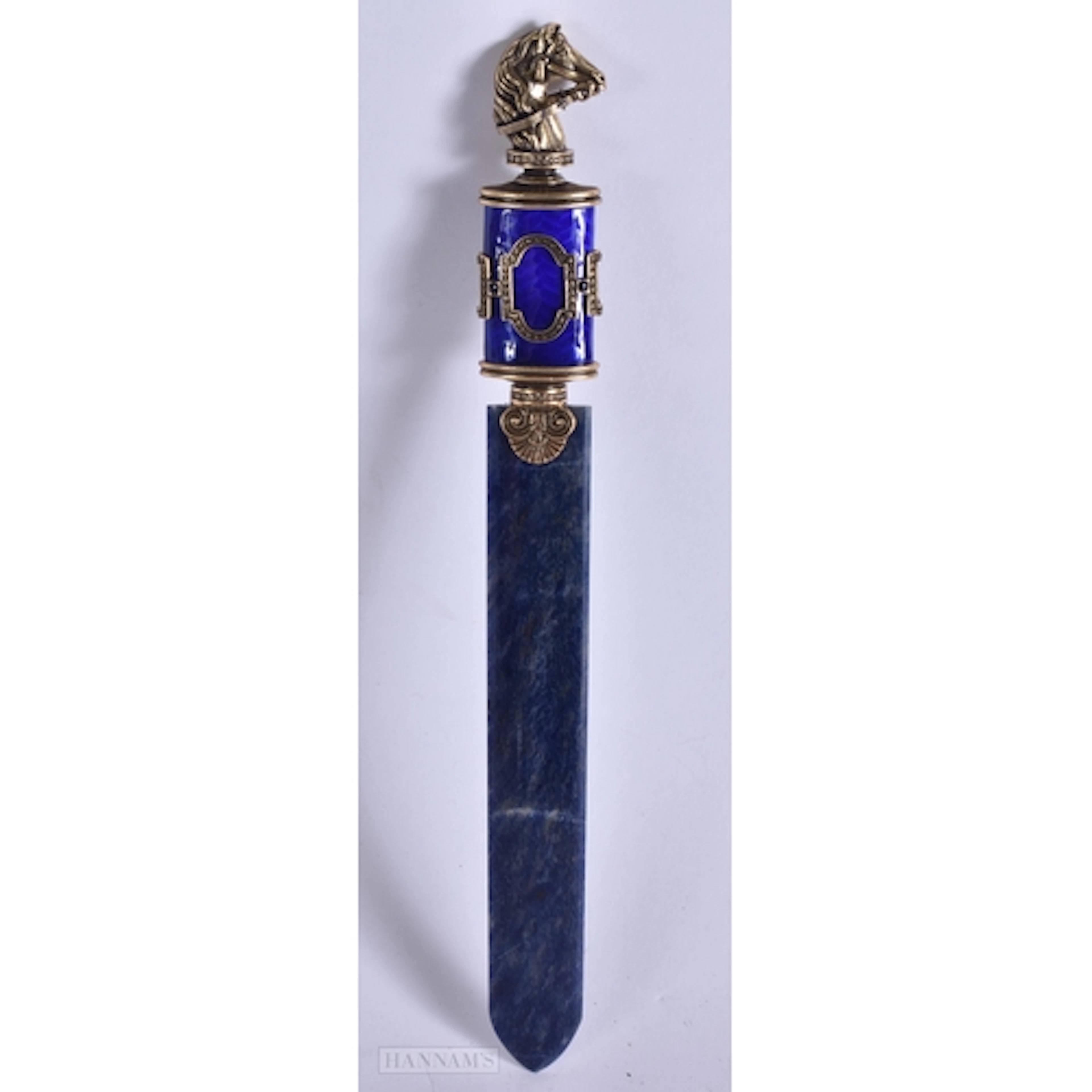 A CONTINENTAL SILVER GILT ENAMEL AND LAPIS LAZULI LETTER OPE...