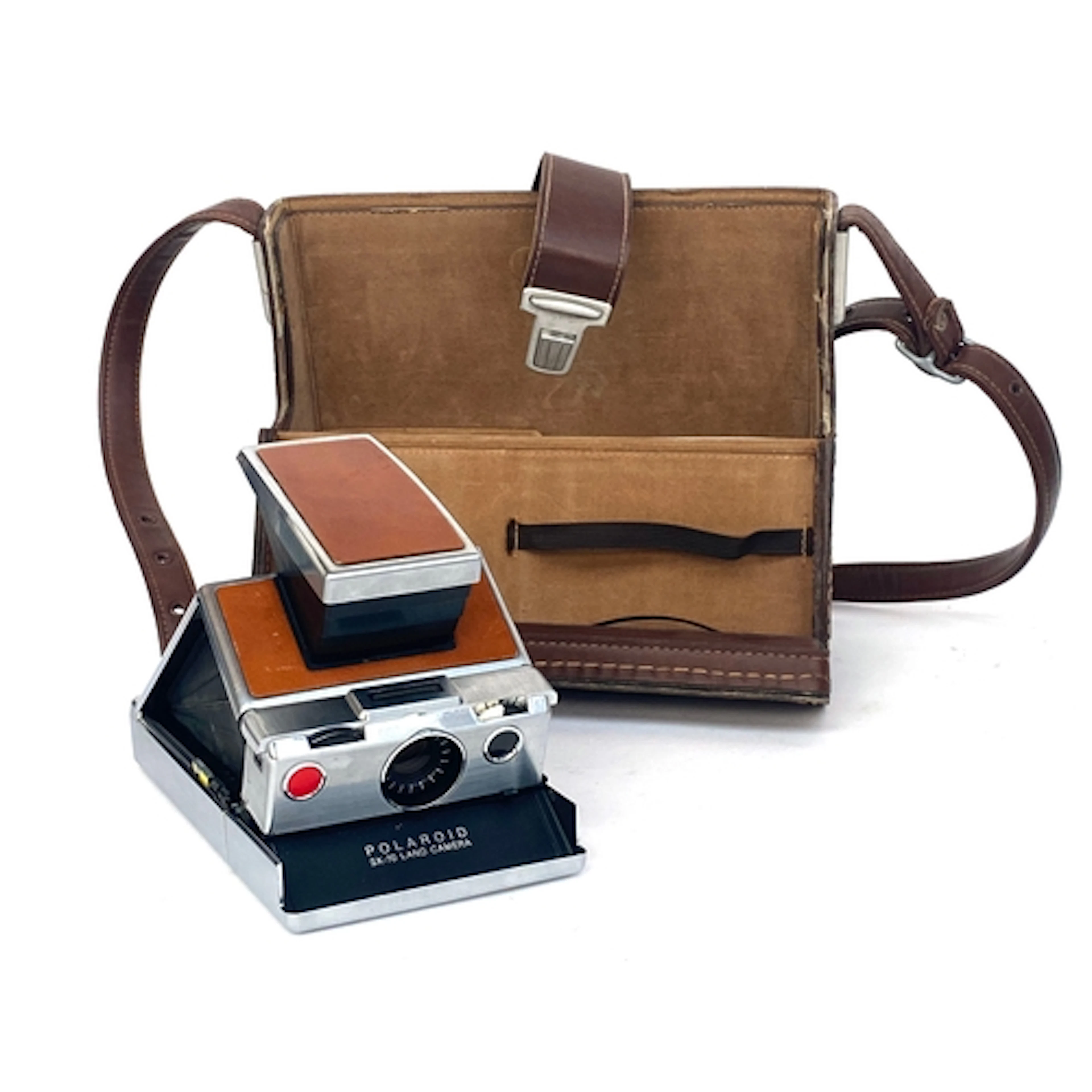 A Polaroid SX-70 camera, with brown leather Polaroid case (u...