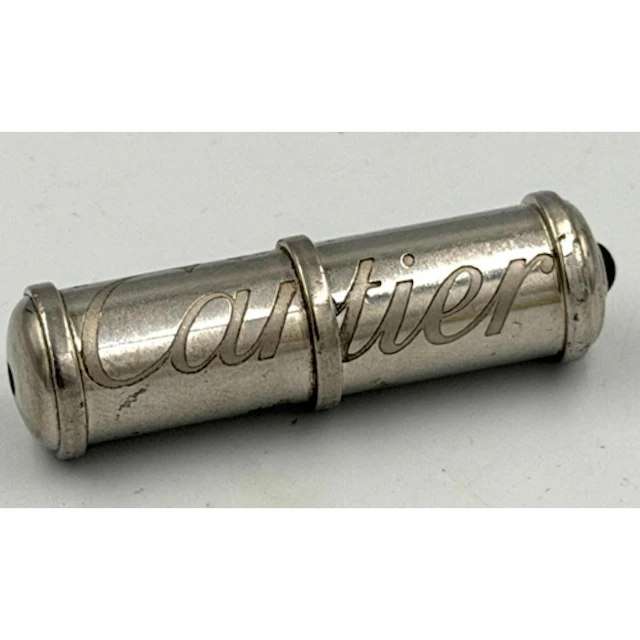 A Cartier pill box or capsule pendant