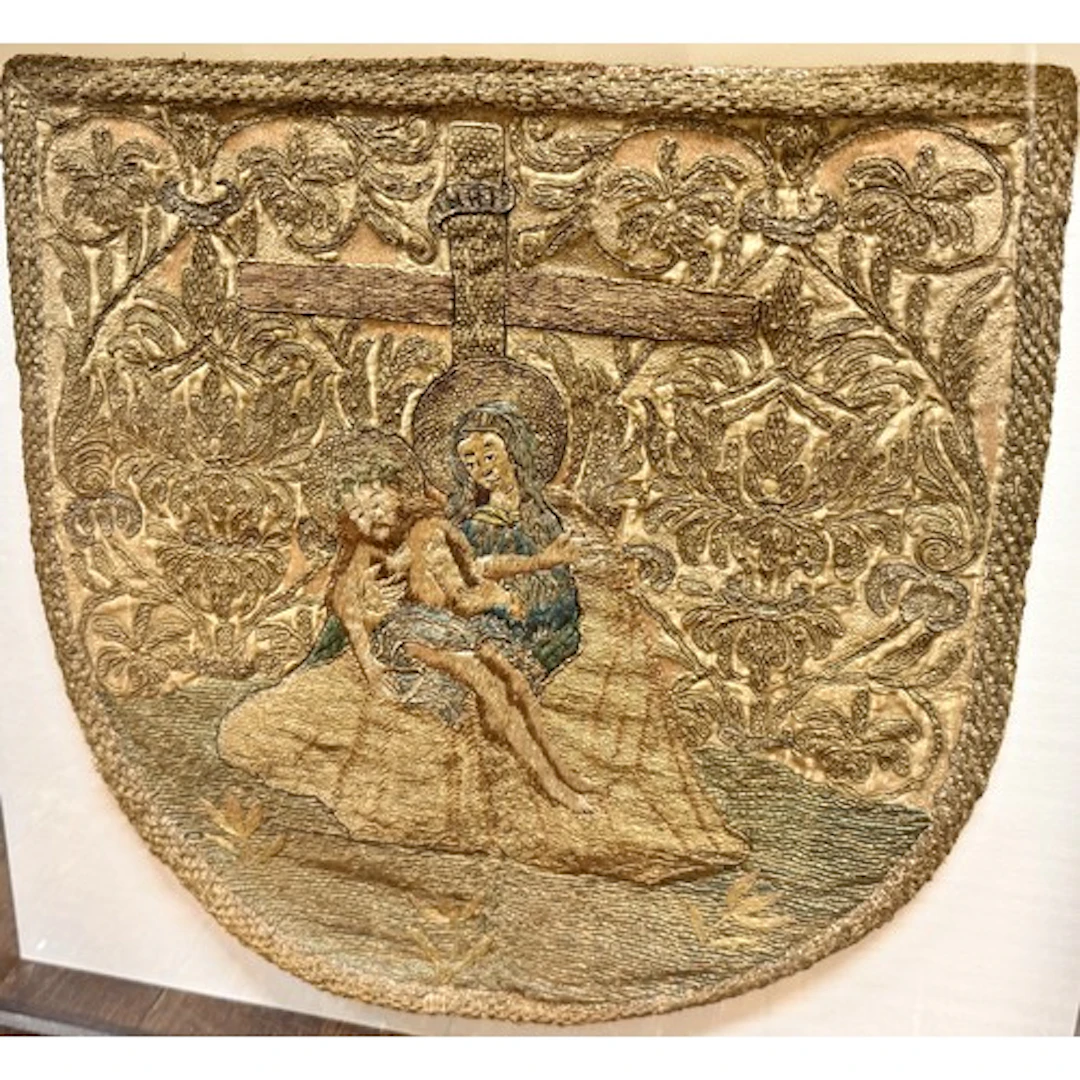 A late Gothic embroidered cope hood or capillo depicting the...