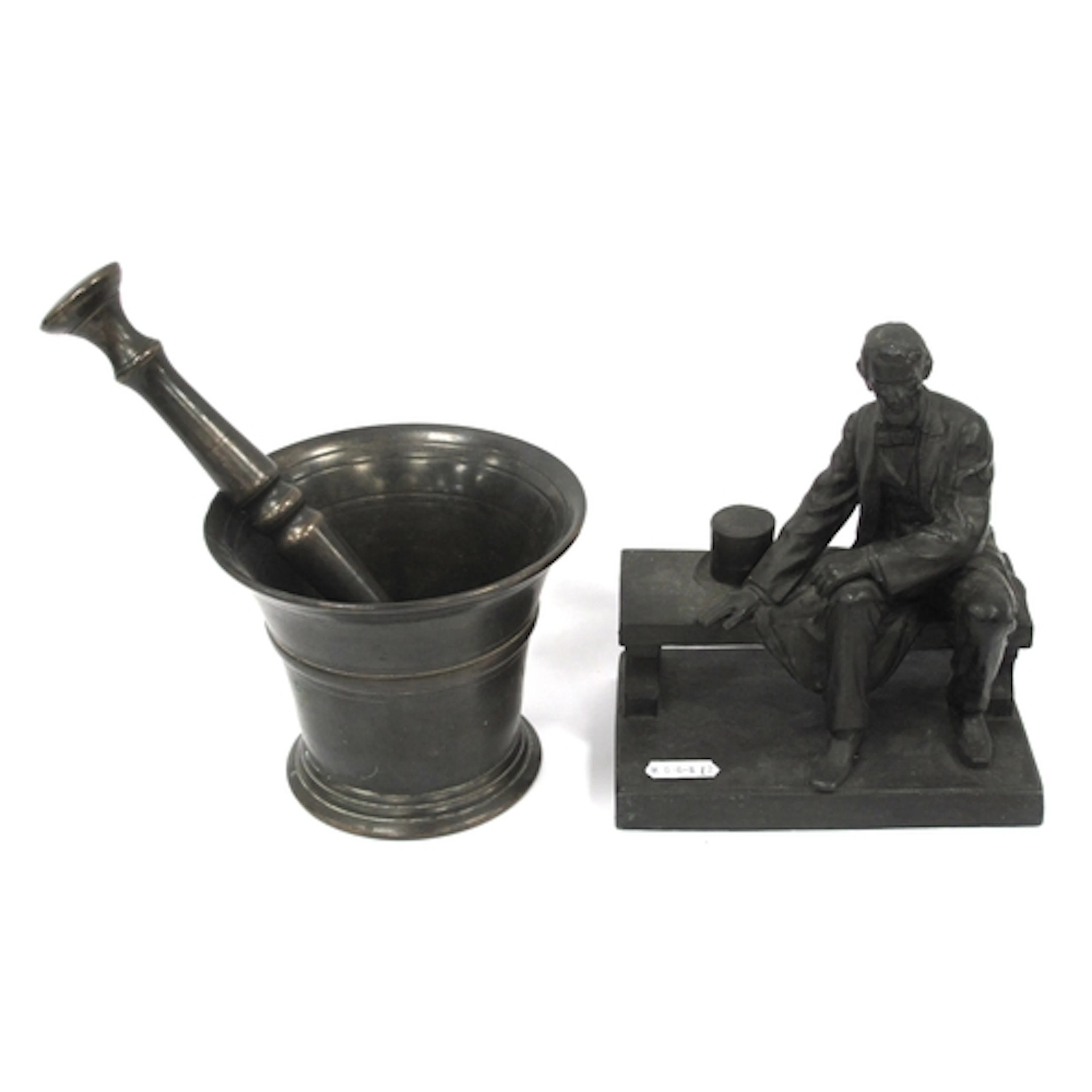 Spelter figure of Abraham Lincoln seated on a bench (H17cm),...