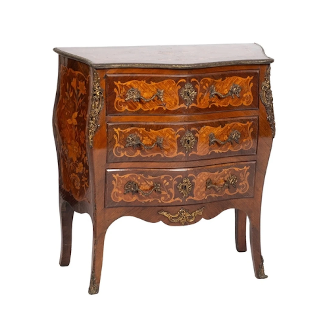 A kingwood and floral marquetry serpentine front commode in ...