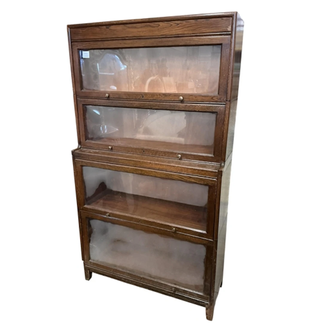 A Globe Wernicke type oak section bookcase, signed Angus, wi...