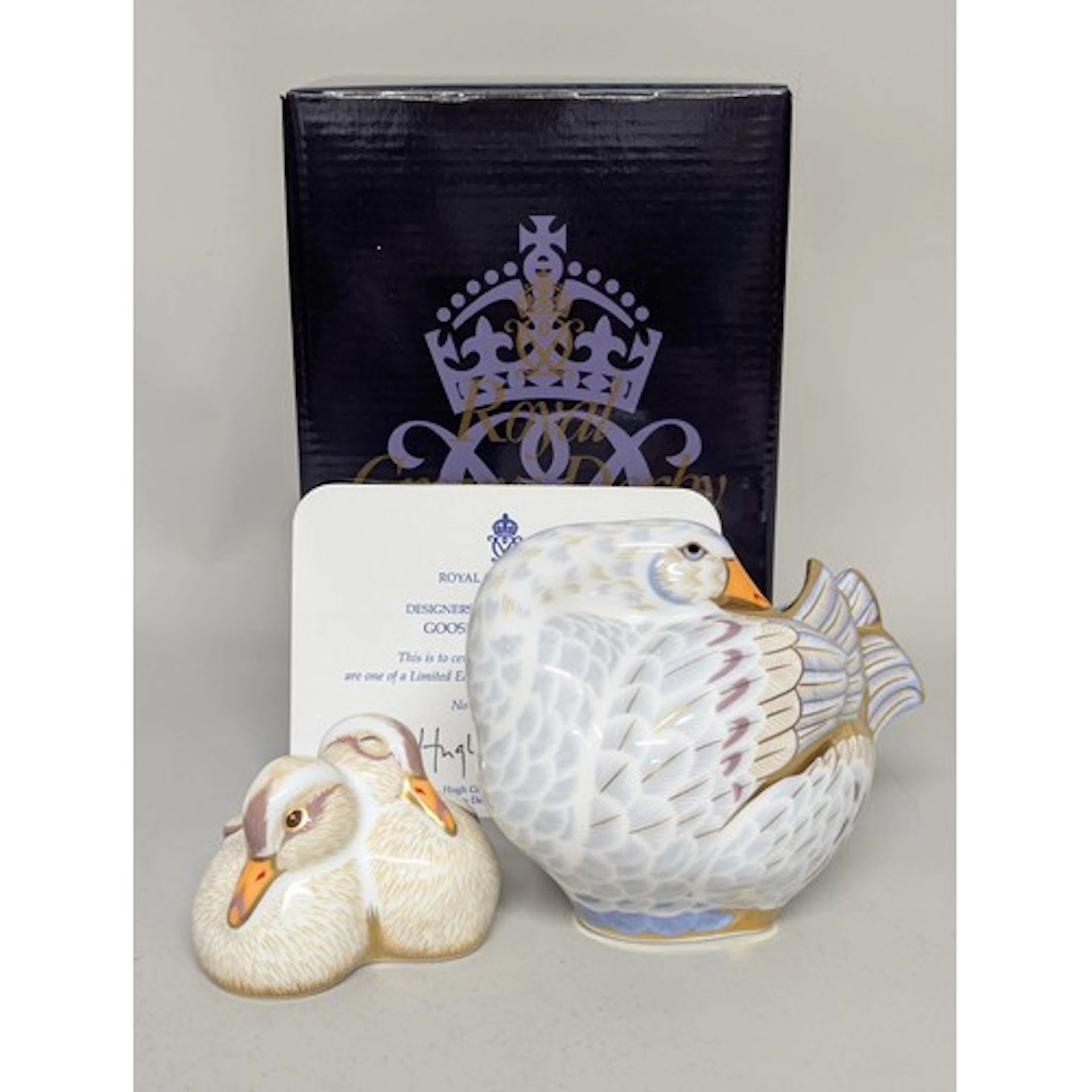 A Royal Crown Derby paperweight family group, Designers' Cho...