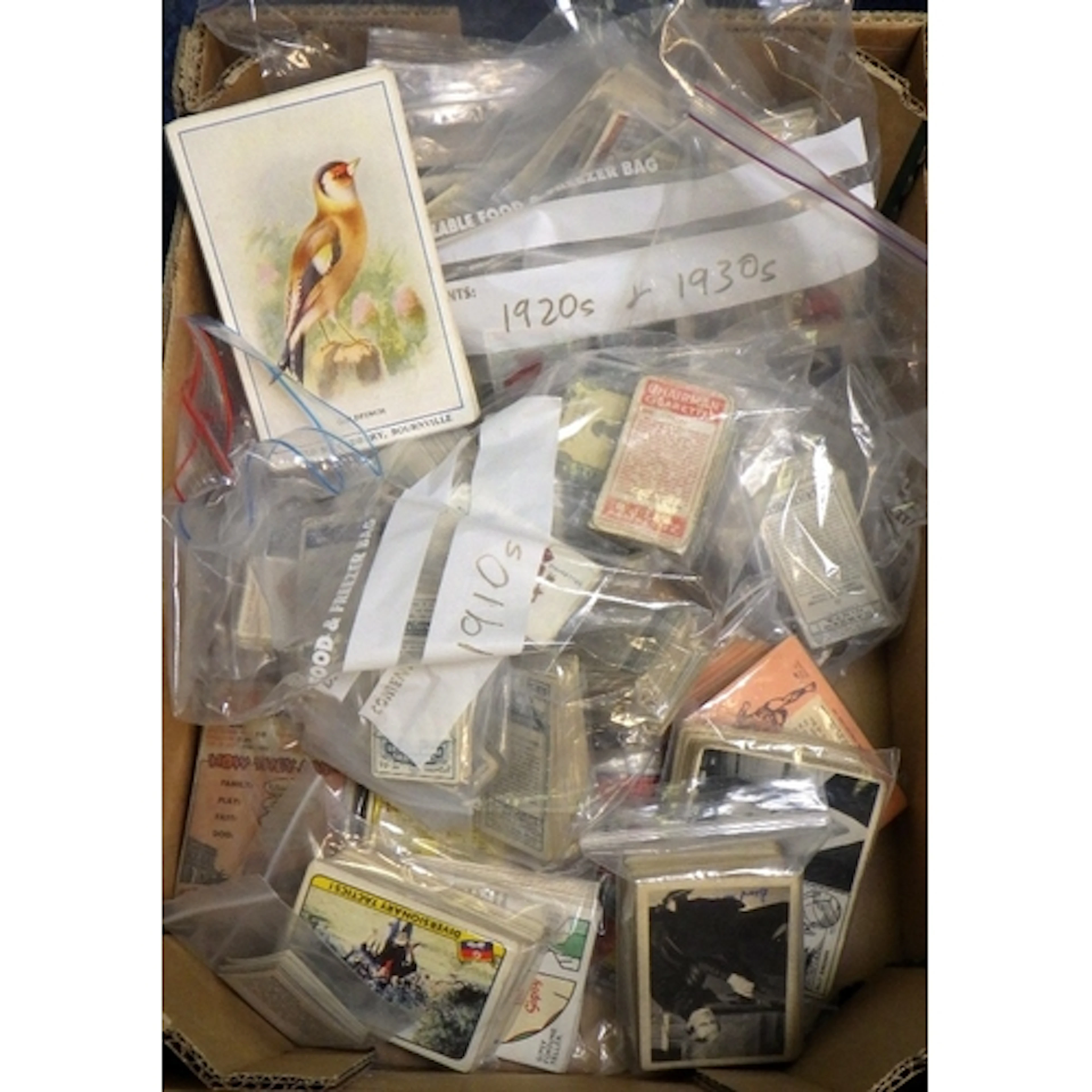 A qty of trade cards, cigarette cards etc