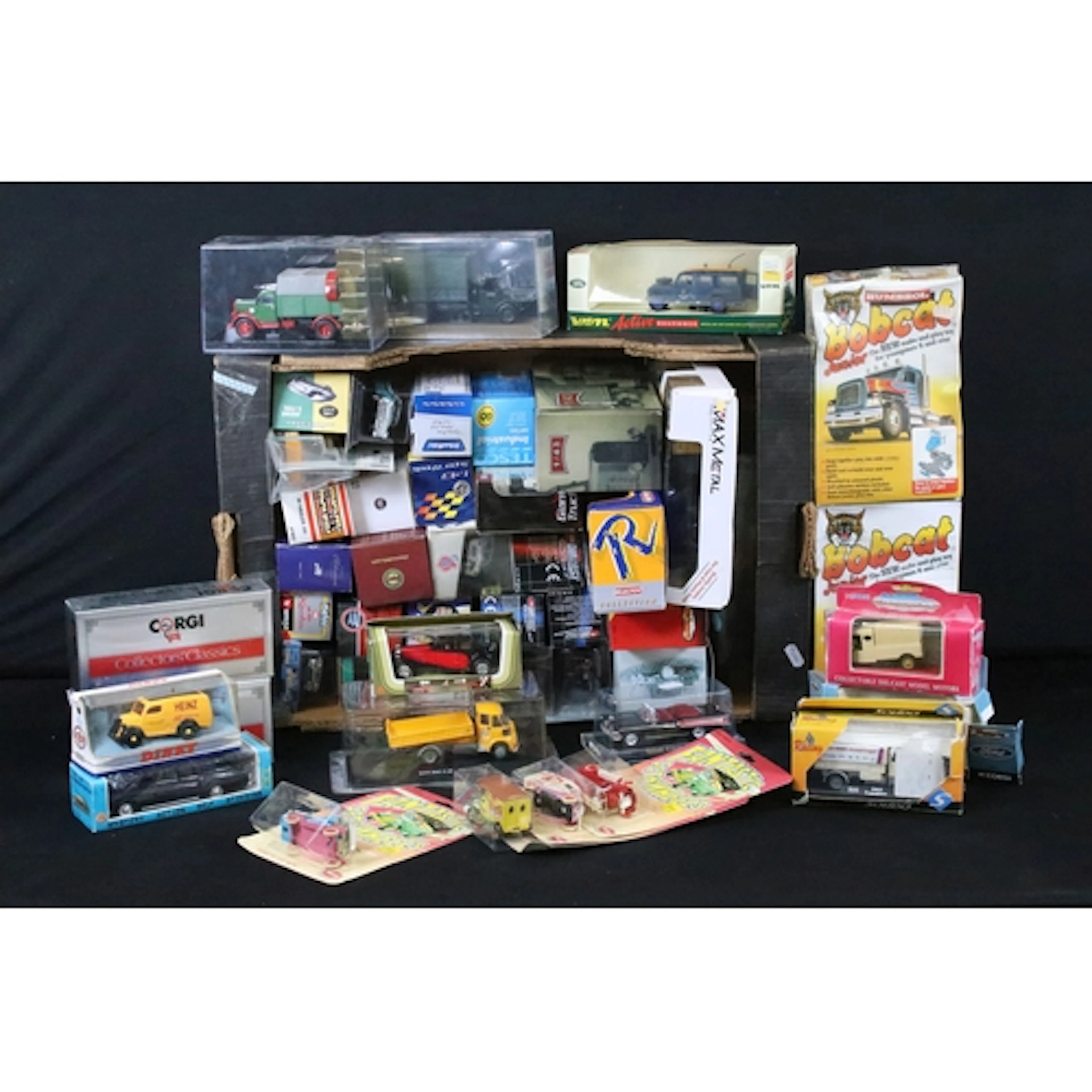 Around 50 boxed / carded diecast models to include Majorette...