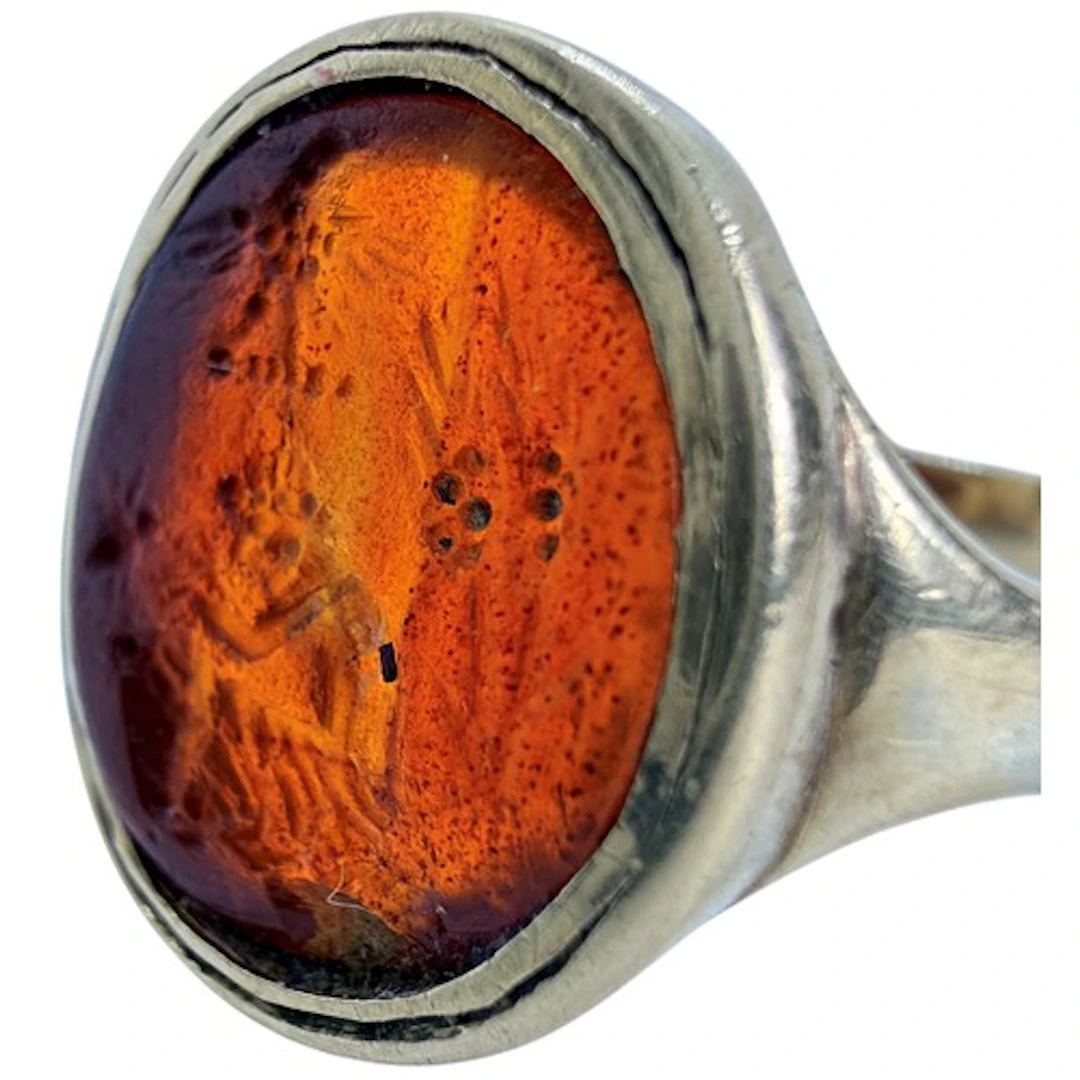 An Ancient Roman carnelian intaglio engraved with a complex ...