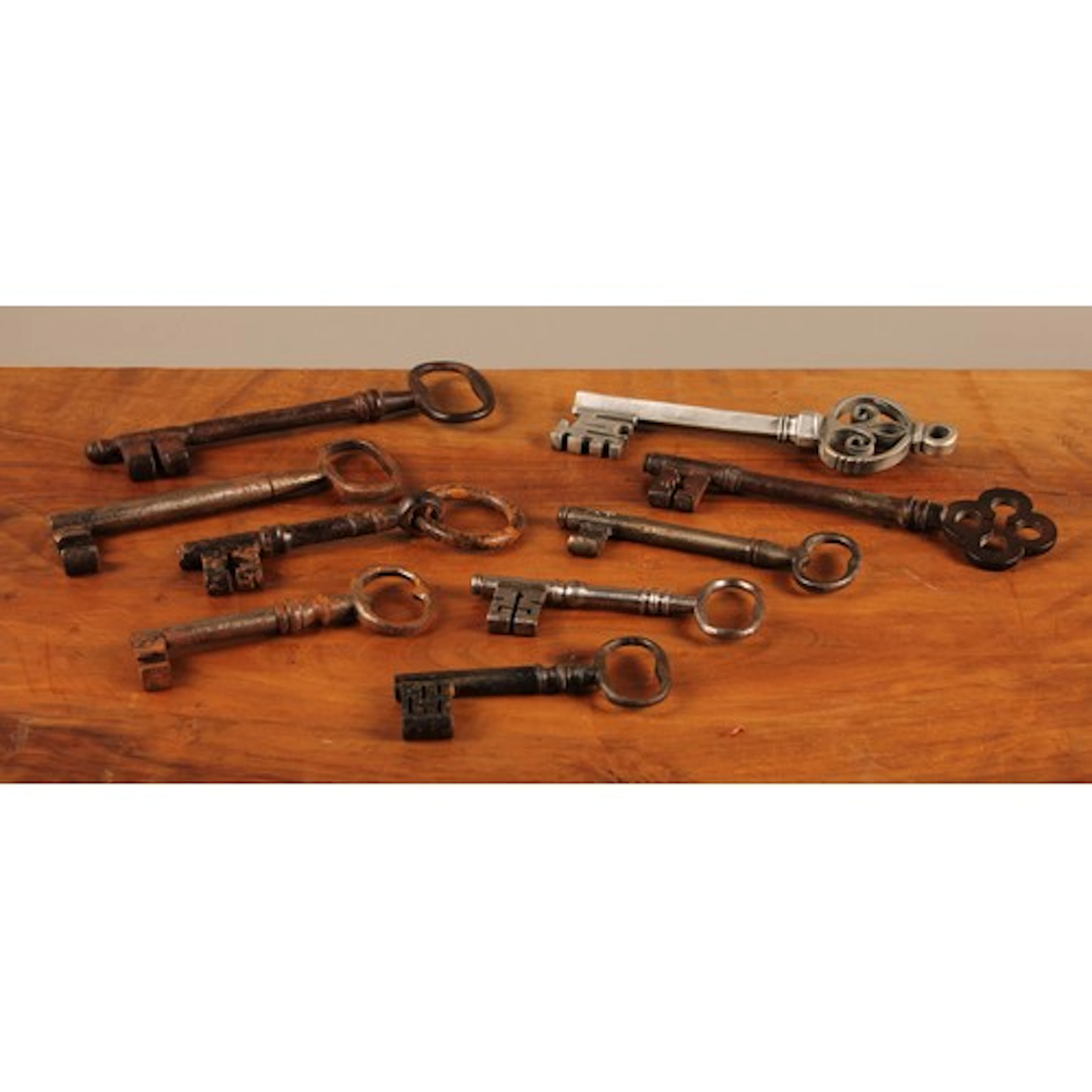 A 19th century cast iron key, in the Gothic manner, quatrefo...
