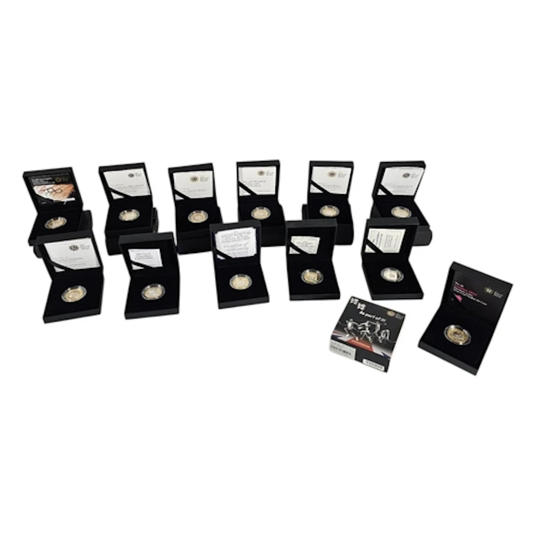 A COLLECTION OF TWELVE COMMEMORATIVE SILVER TWO POUND PROOF ...
