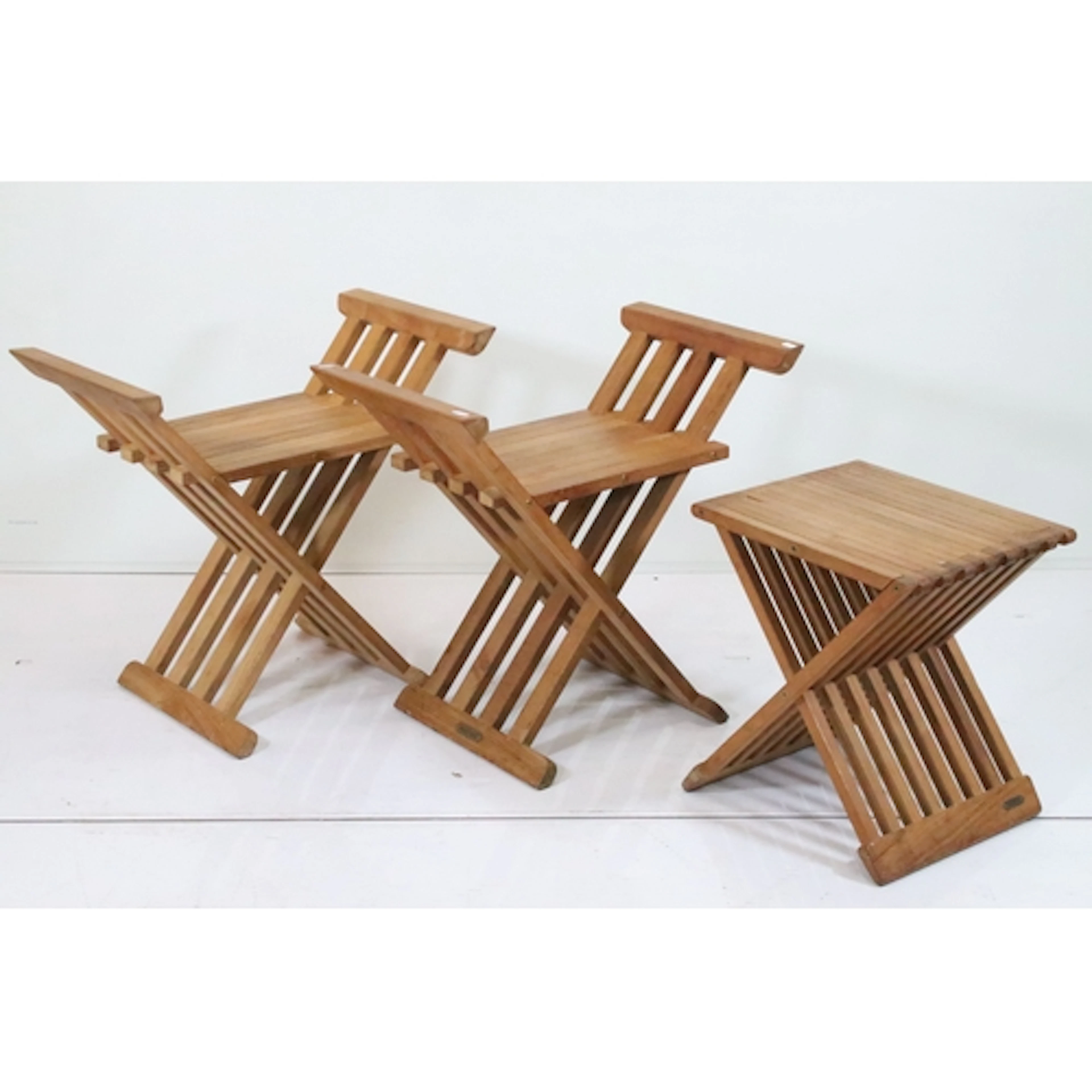 Pair of Danish Fritz Hansen Skagerak folding teak stools, on...