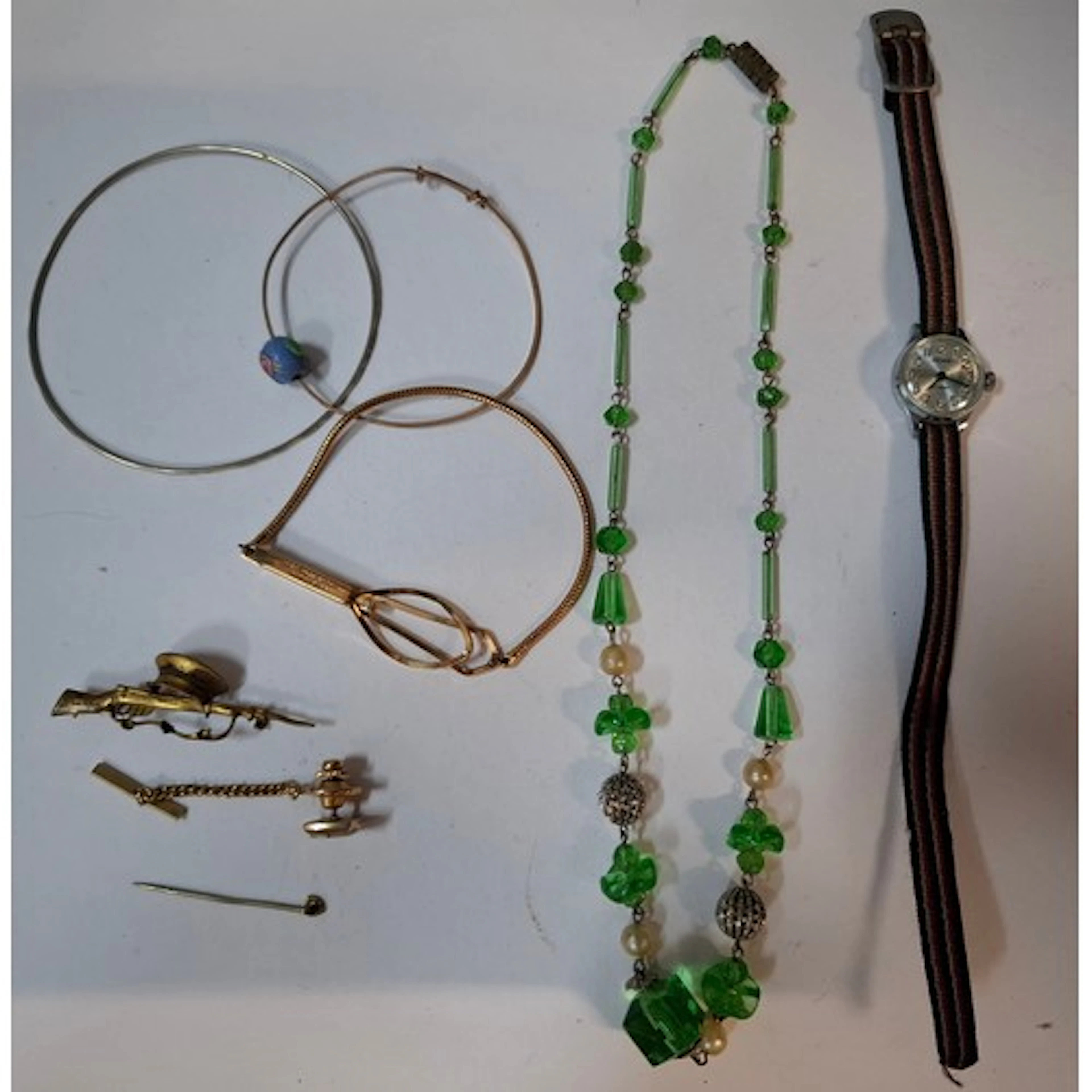 A small quantity of costume jewellery and a ladies watch to ...
