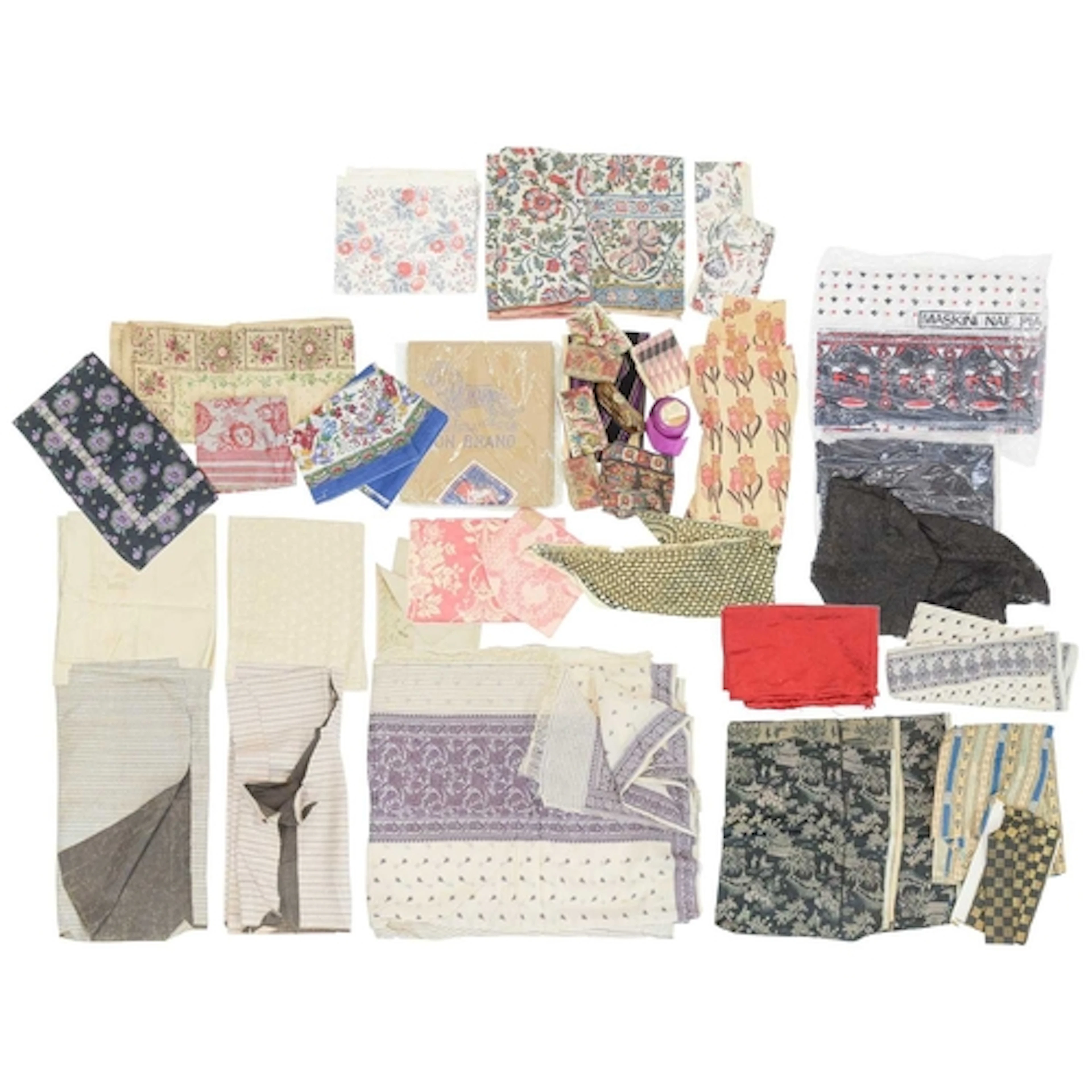 Antique haberdashery. A collection of fabrics and ribbons, 1...