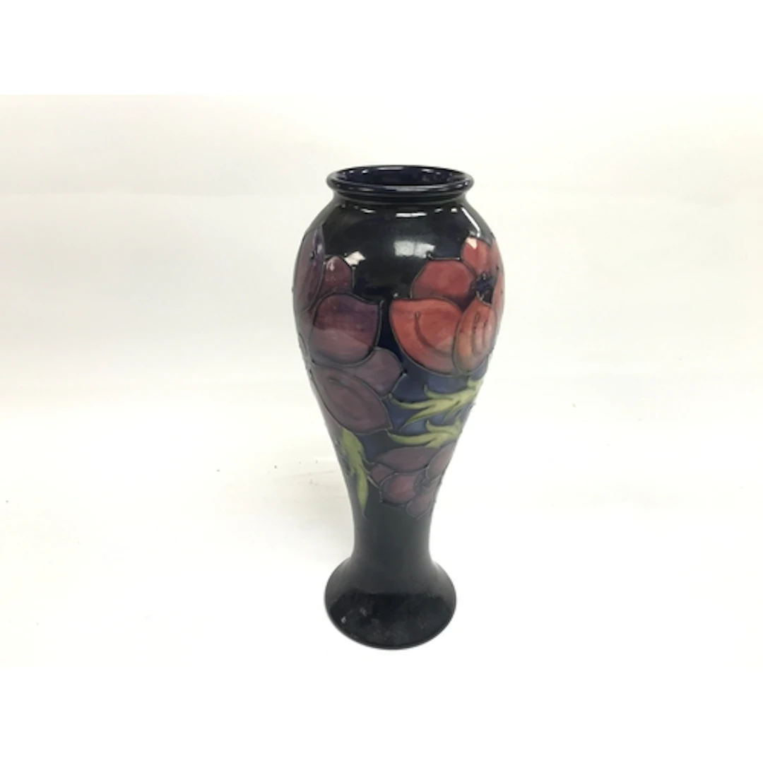 Moorcroft Pottery ceramic vase decorated in the signature tu...