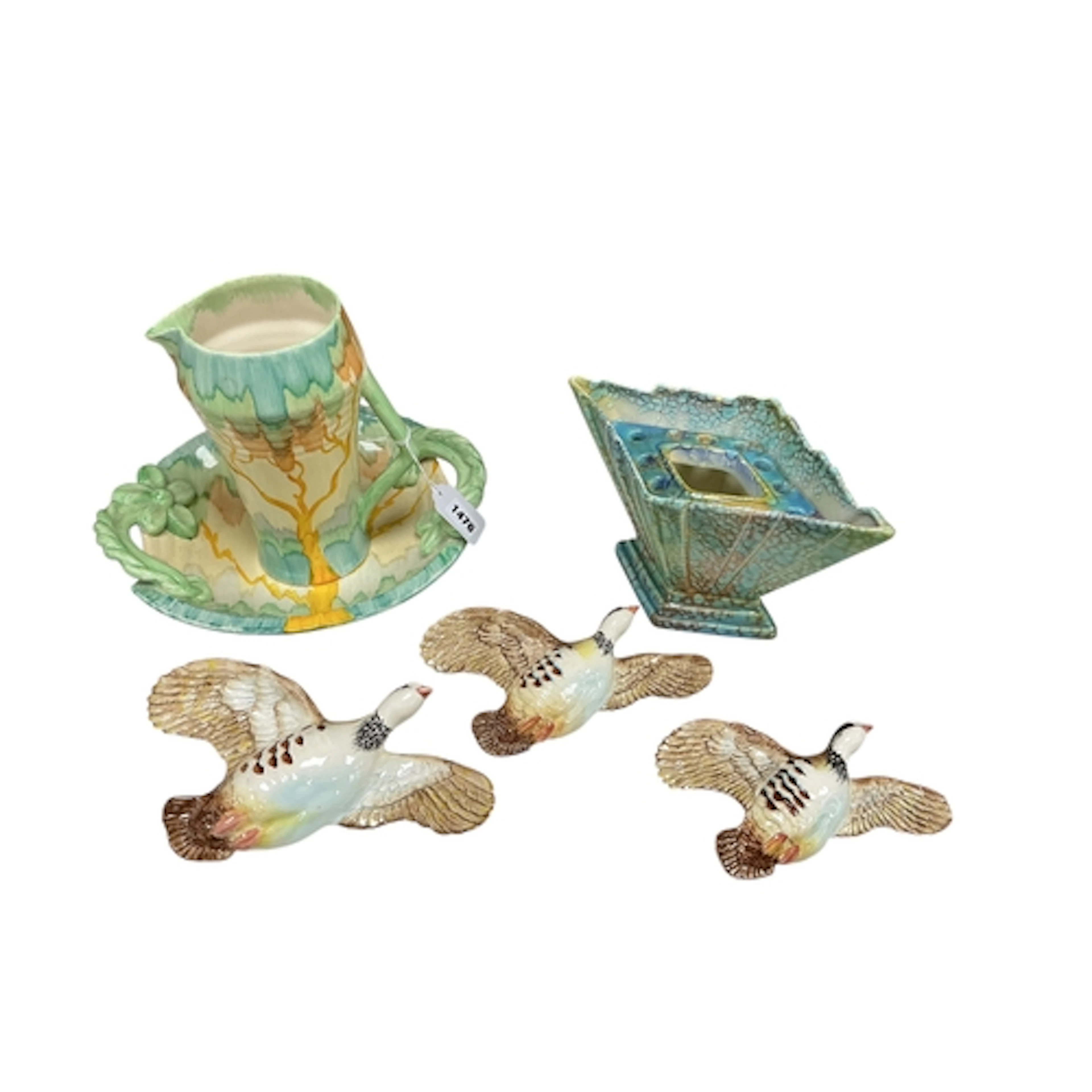 A graduated set of three Beswick pottery pink legged Partrid...