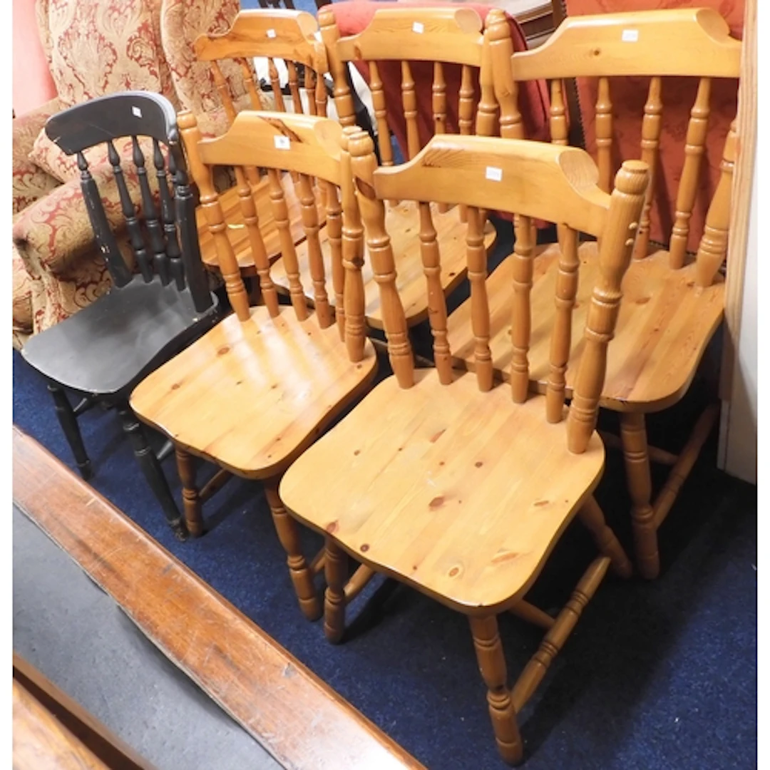 A lot comprising a set of four 20th century pine spindle bac...