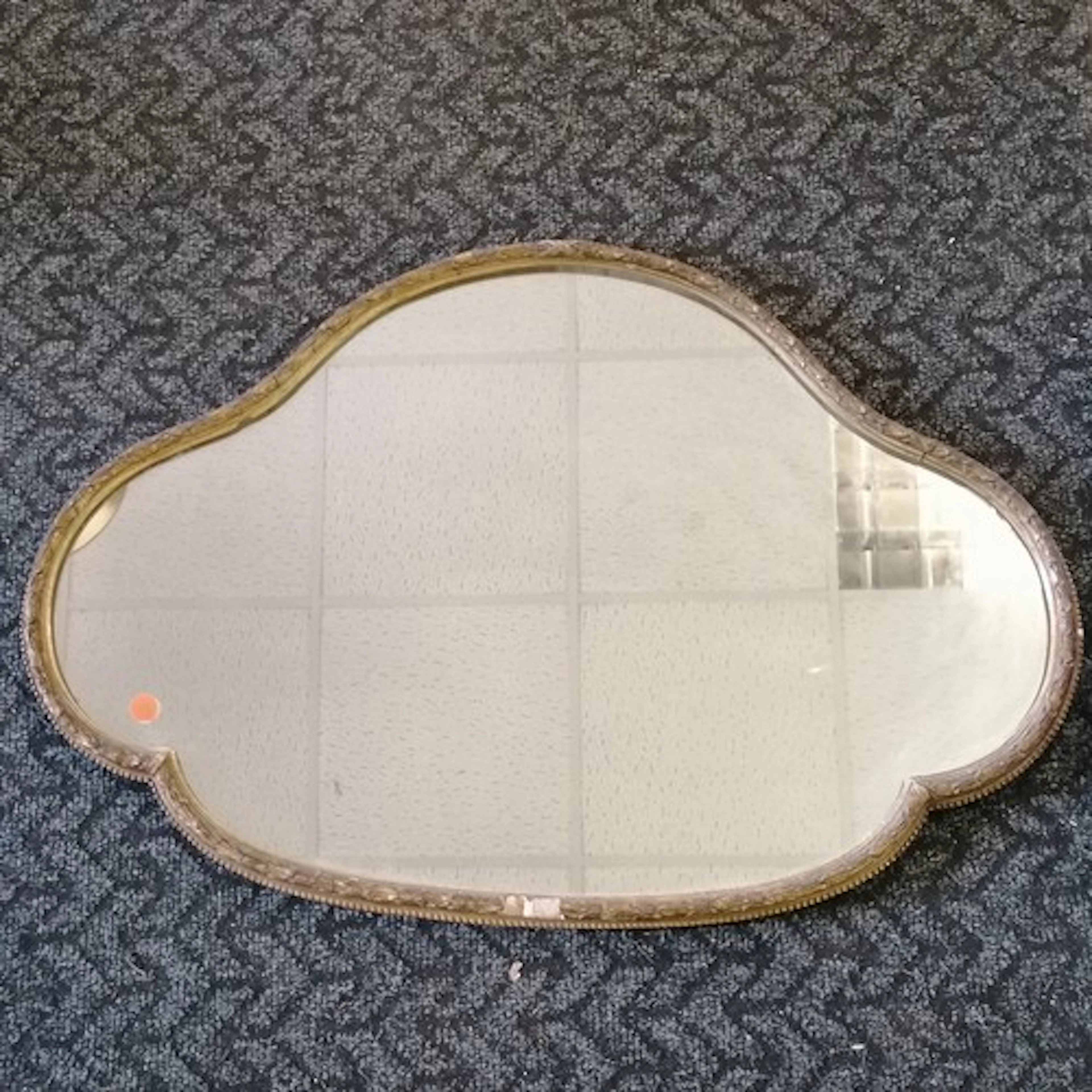 Antique shaped gilt framed mirror 68cm x 54cm - some losses