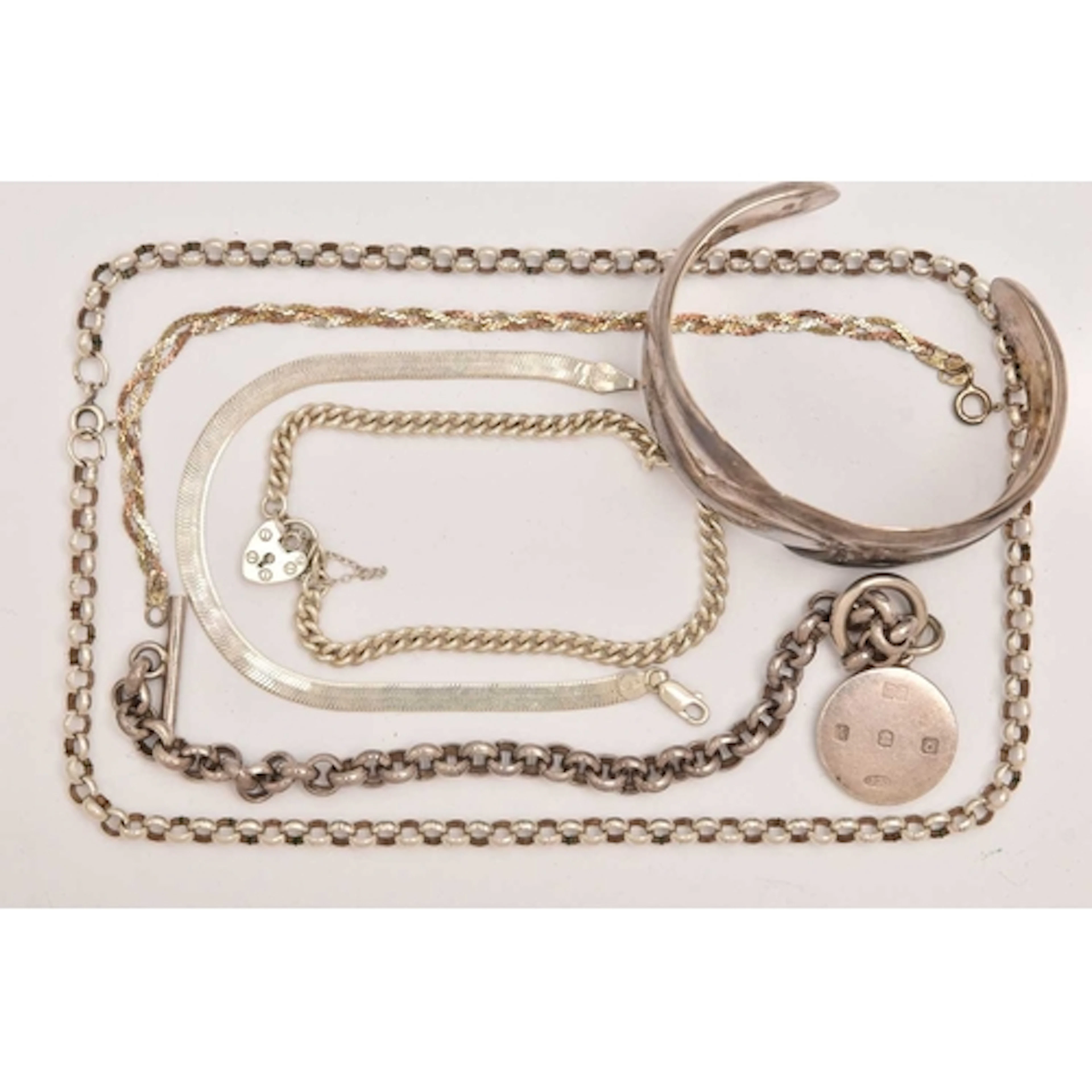 AN ASSORTMENT OF SILVER AND WHITE METAL, to include a silver...
