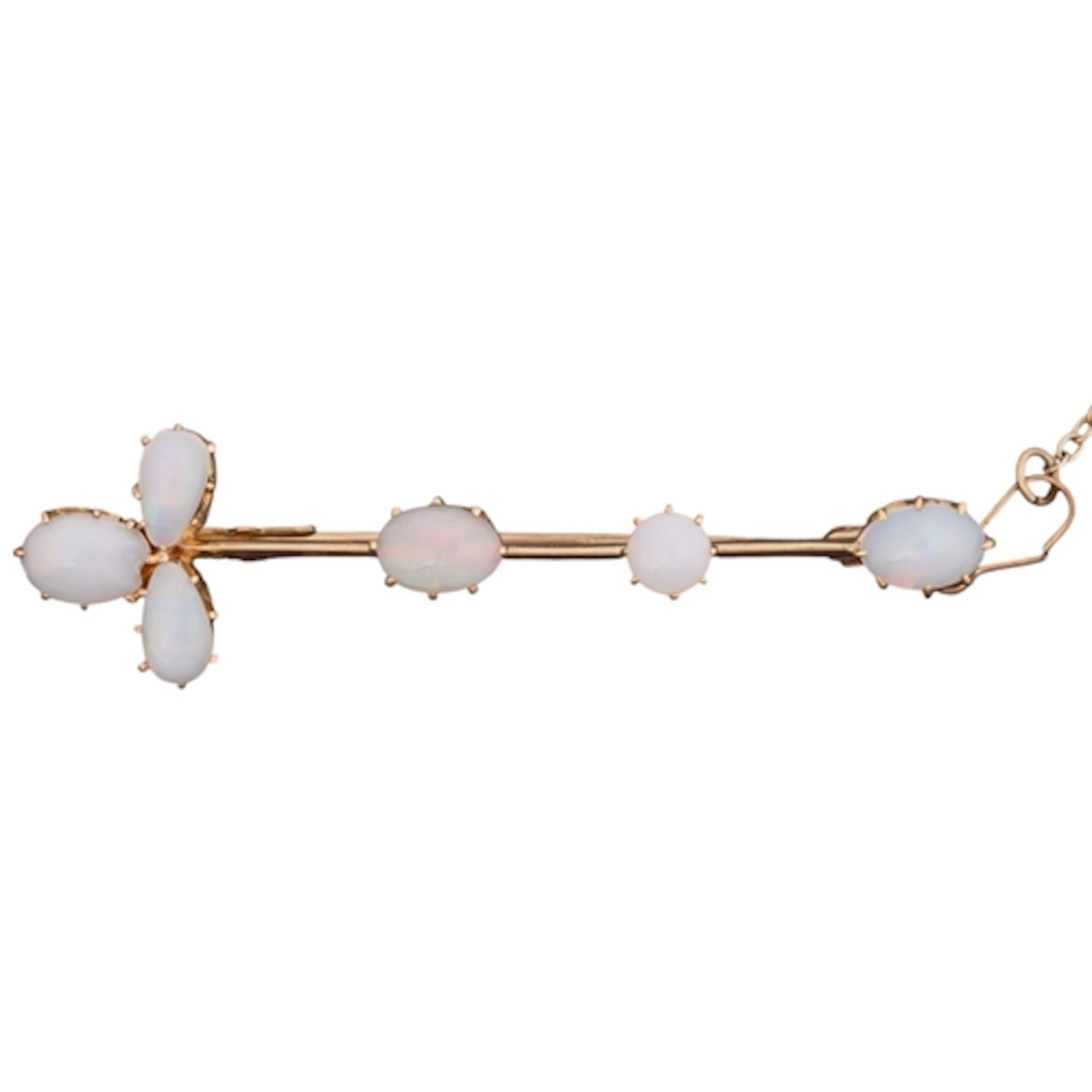 A 14ct gold opal bar brooch, claw set with oval and pear cab...