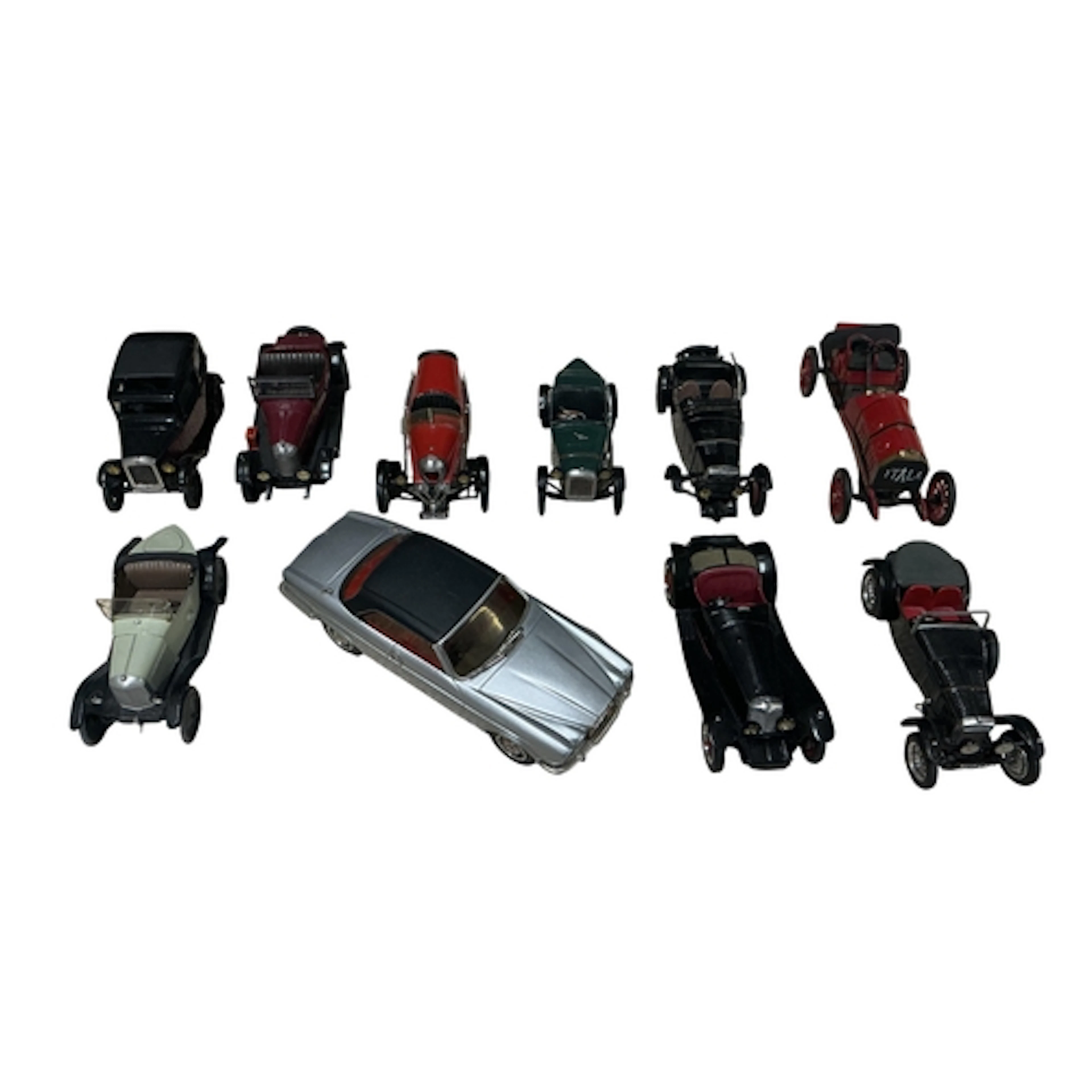 Nine Wills Finecast 1:43 scale white metal models of early s...