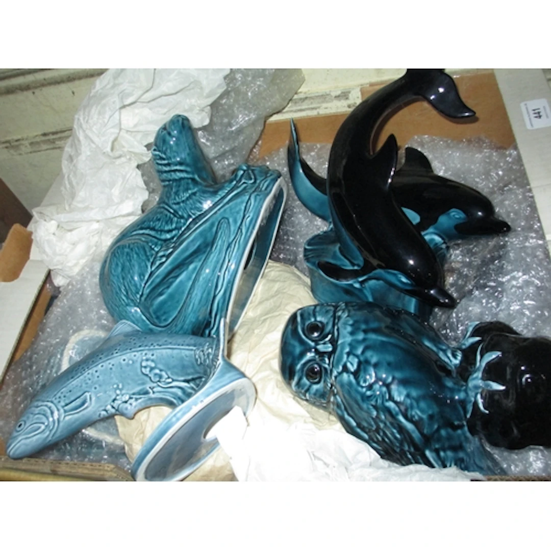 Box containing a collection of various Poole Pottery animals...