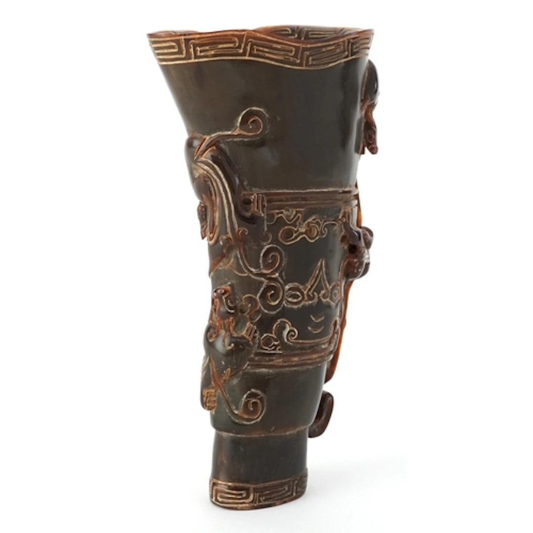 Large Chinese carved horn libation cup profusely decorated i...