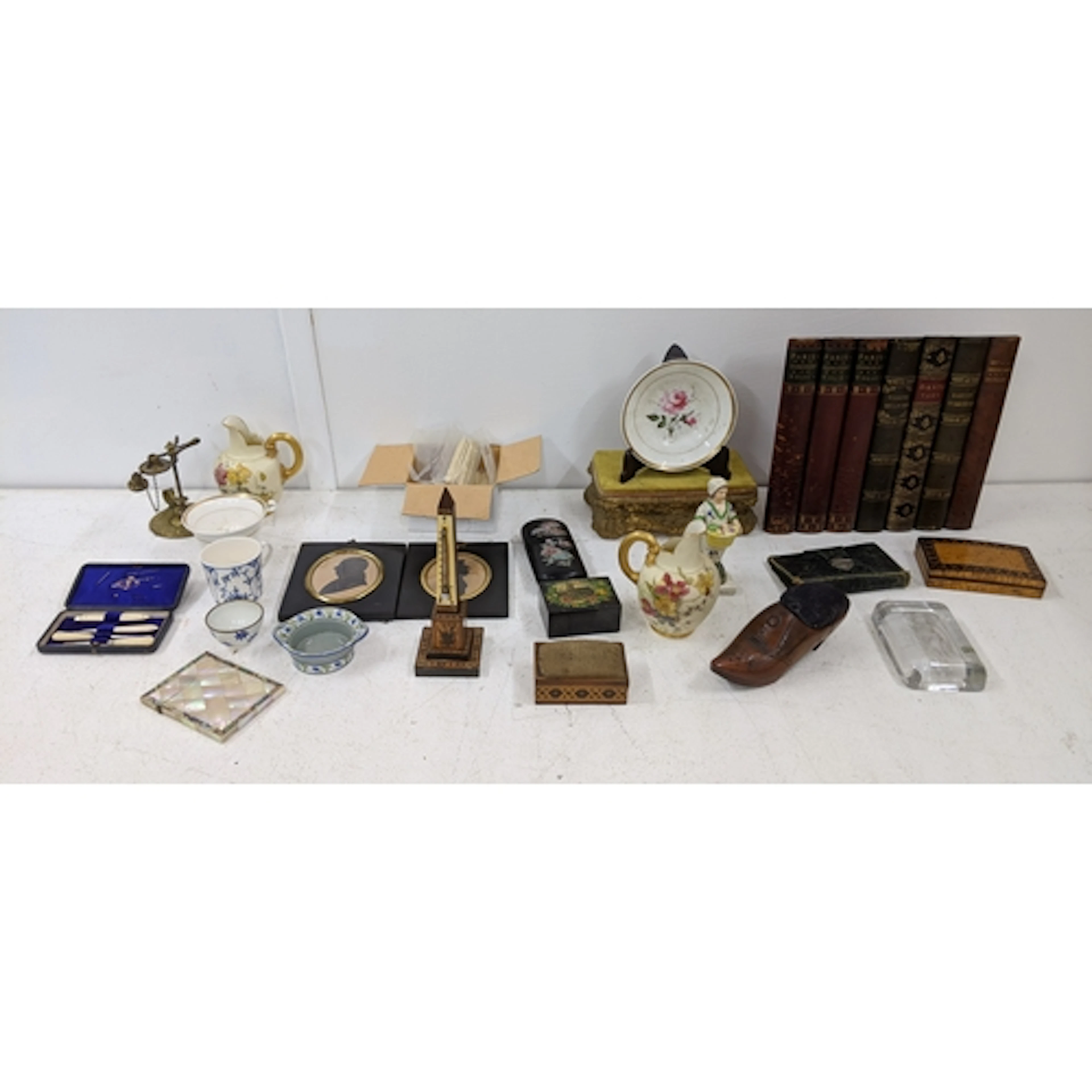 A mixed lot to include: two silhouettes, a Tunbridge Ware th...