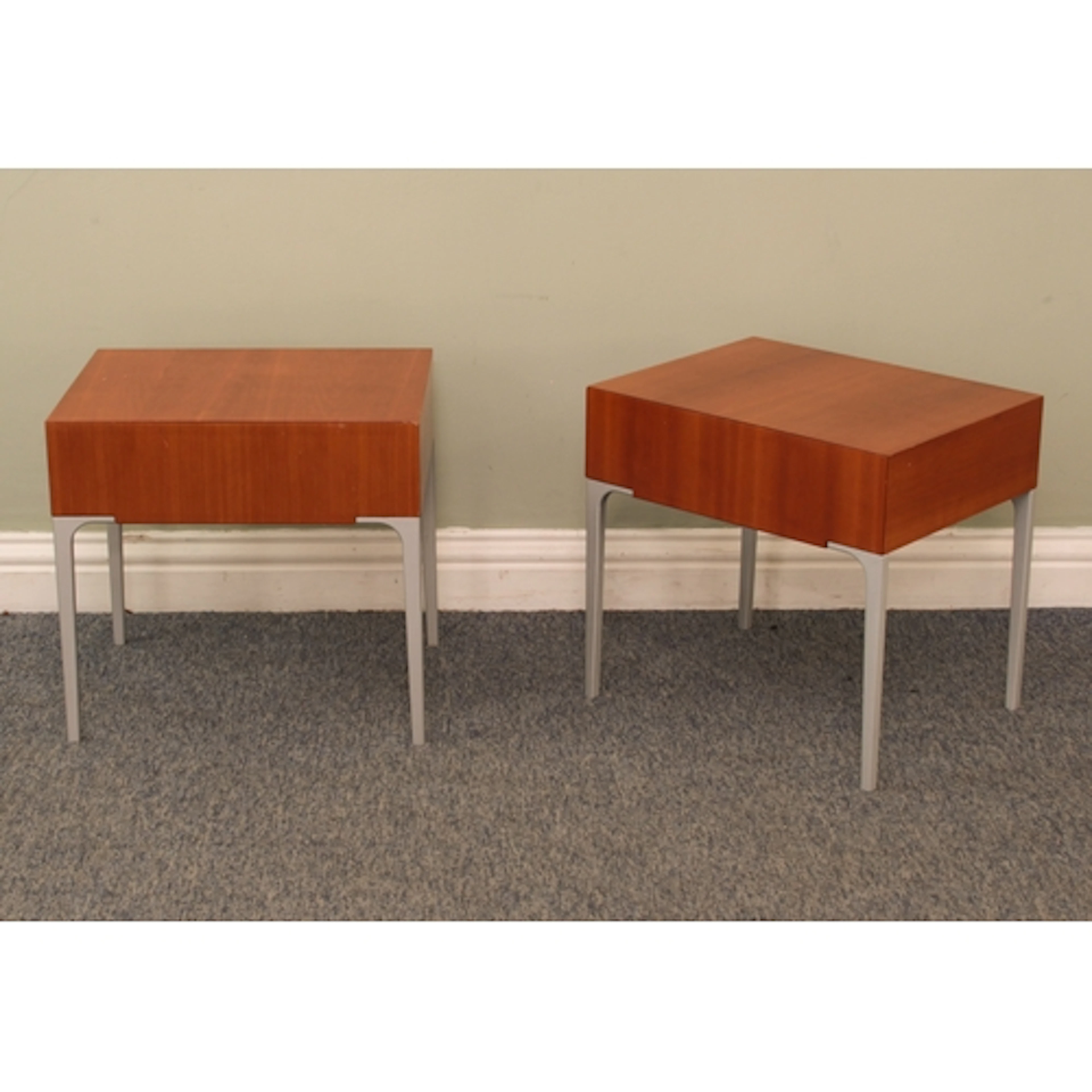 A pair of Cassina cherry wood bedside drawers - probably fro...