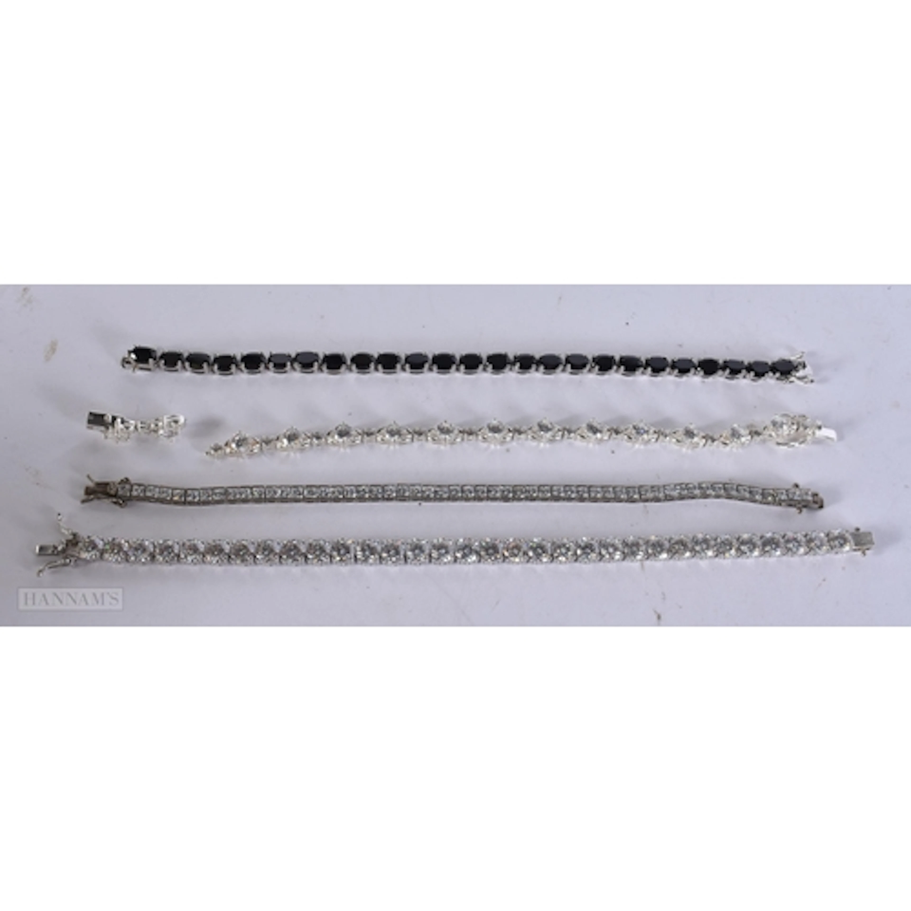 Collection of Sterling Silver Tennis Cubic Zirconia Bracelet...