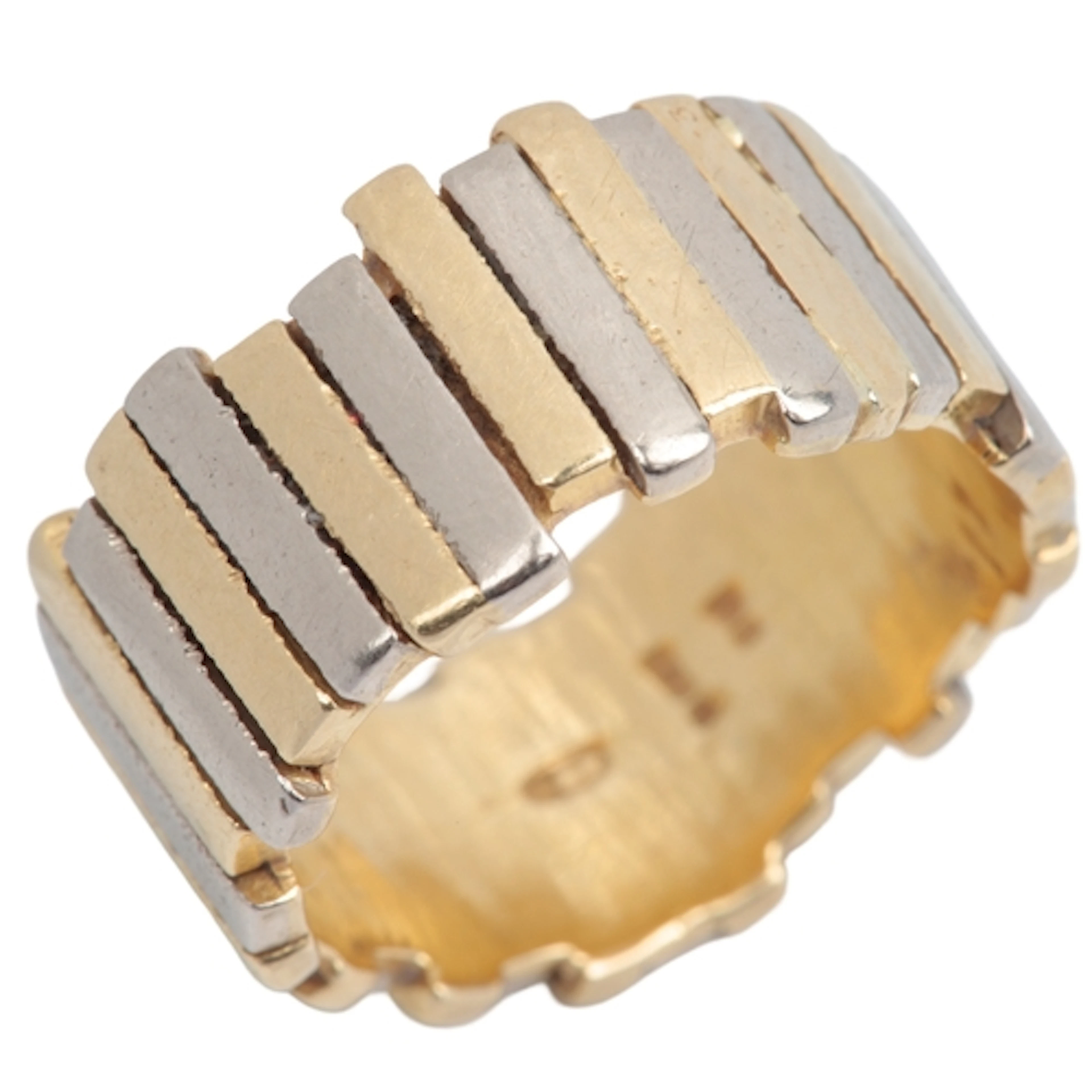 § Gillian Packard, a gold ring, circa 1978, composed of alte...