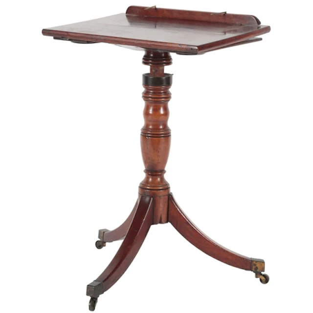 A George III mahogany adjustable reading stand, the rectangu...