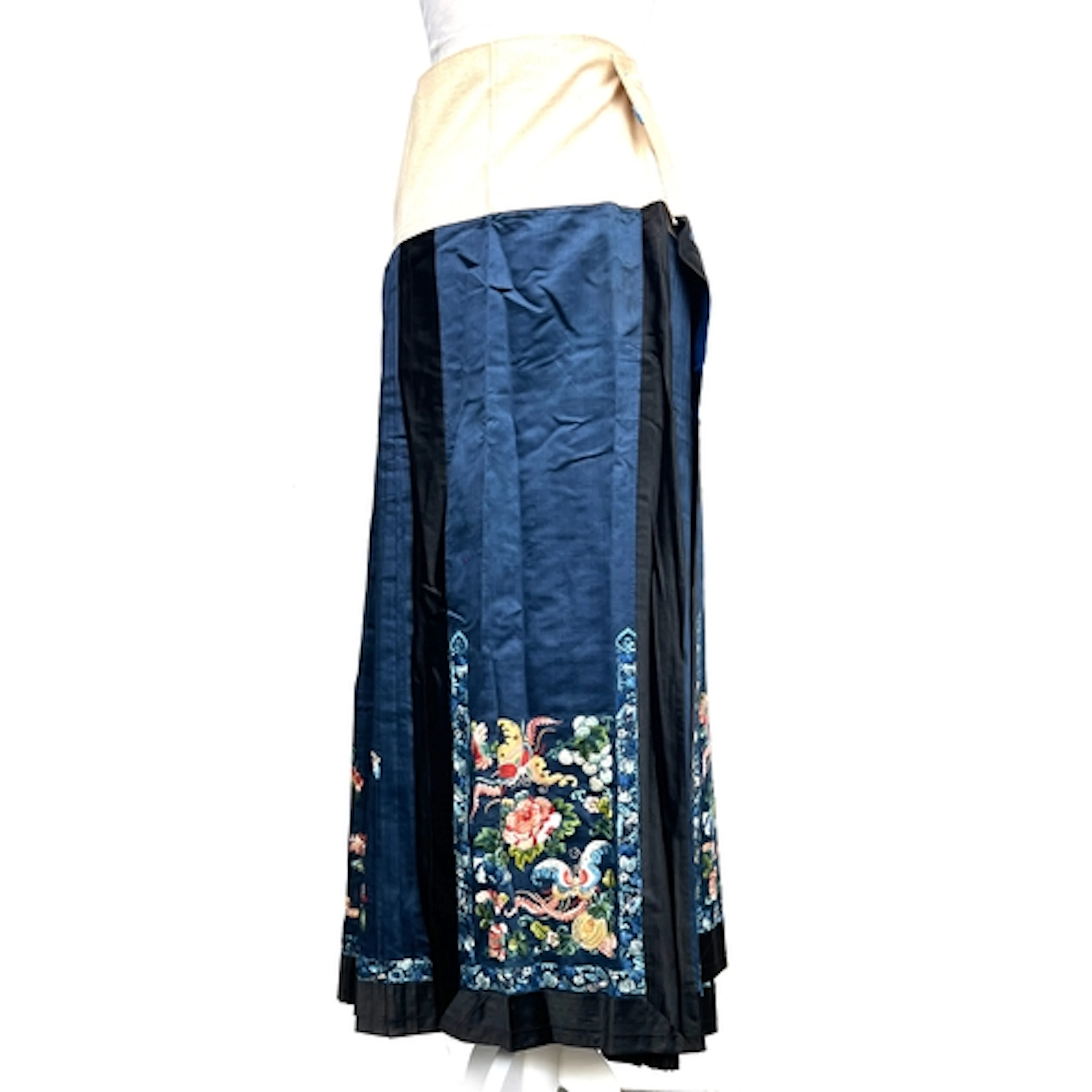 An antique Chinese mamianqun 'horse face' wrap skirt, navy b...