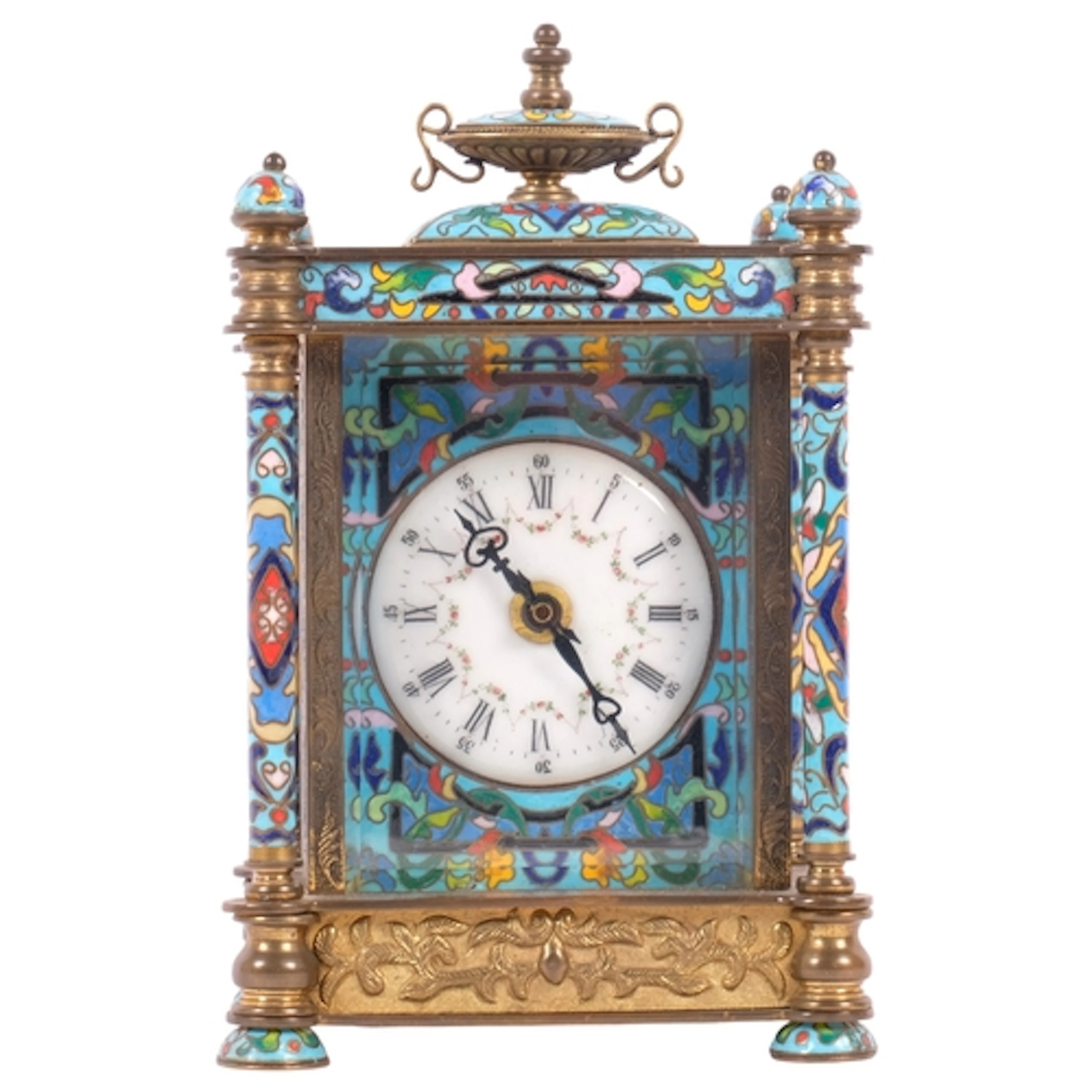 A brass and champleve mantel clock, after the Antique, with ...