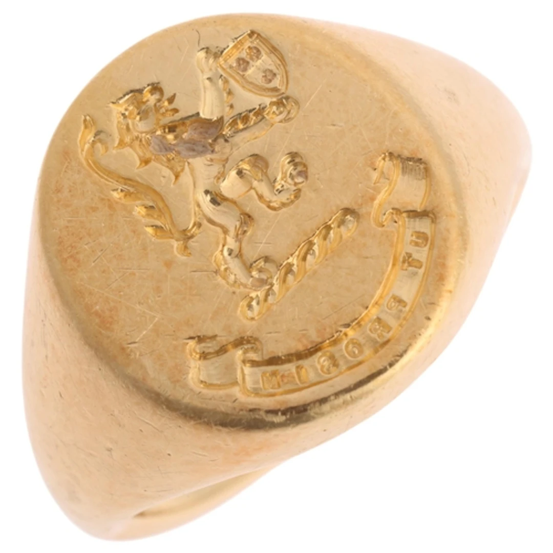 An 18ct gold armorial seal signet ring, maker FG, Birmingham...
