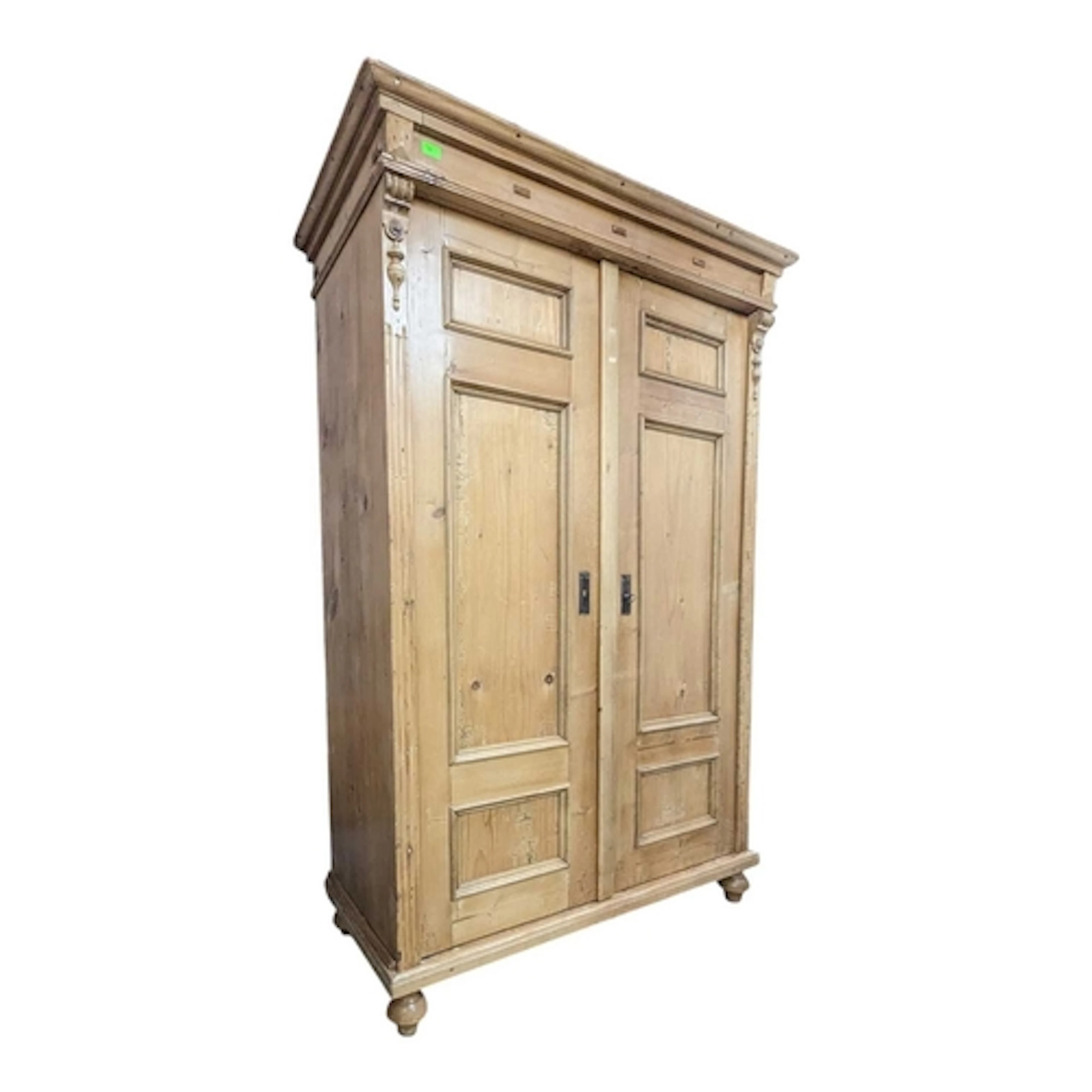 An early 20th centruy Scandinavian pine wardrobe. Having a p...