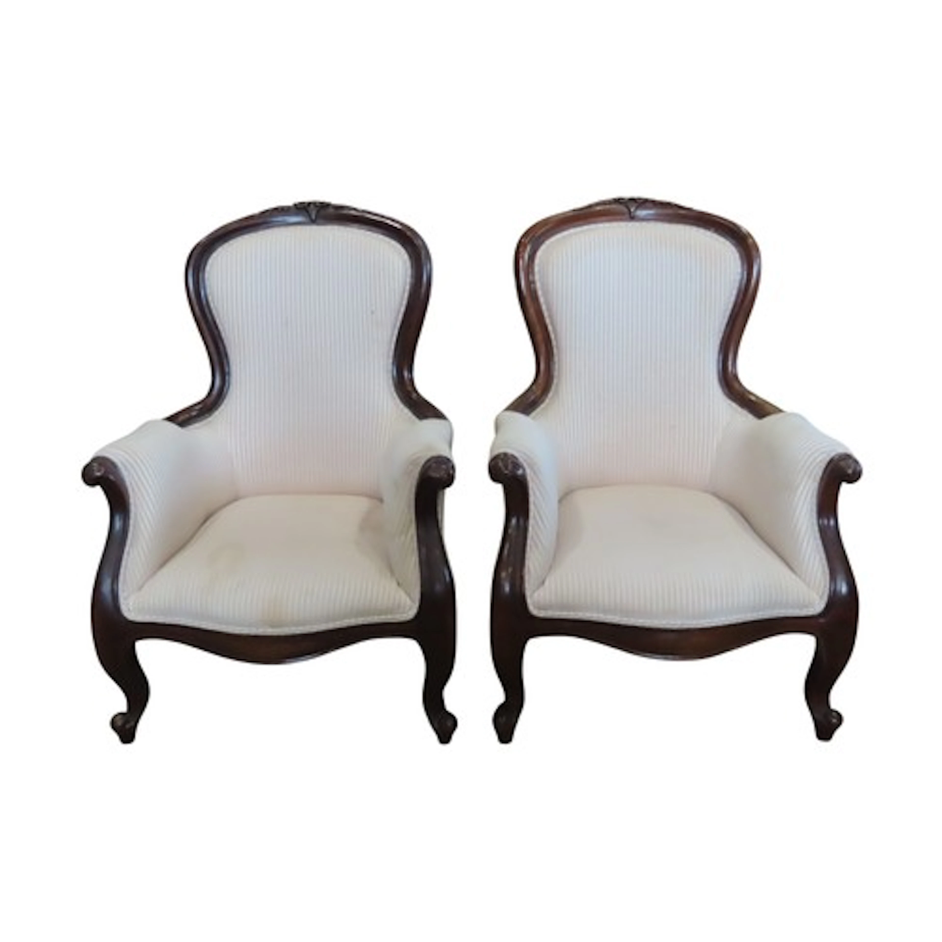 A pair of Victorian style spoonback drawing room chairs with...