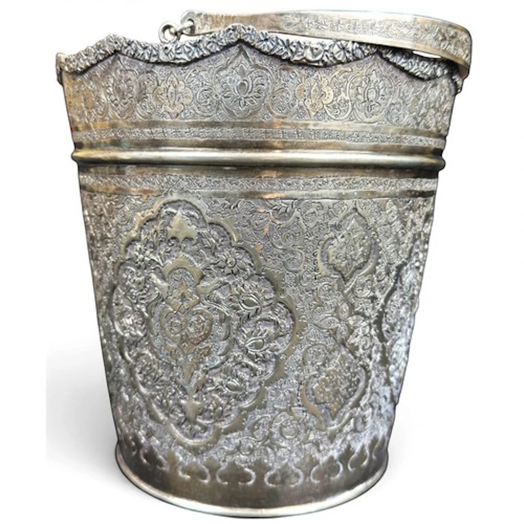 A large Persian silver pale with loop hinged carrying handle...